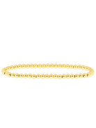 A continuous bracelet made of small, round, shiny gold beads.