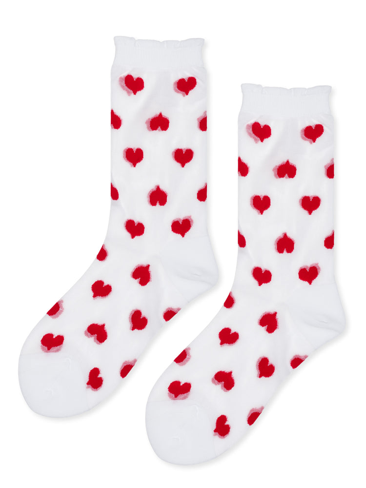 White crew socks feature a red heart print and a ruffled cuff detail.