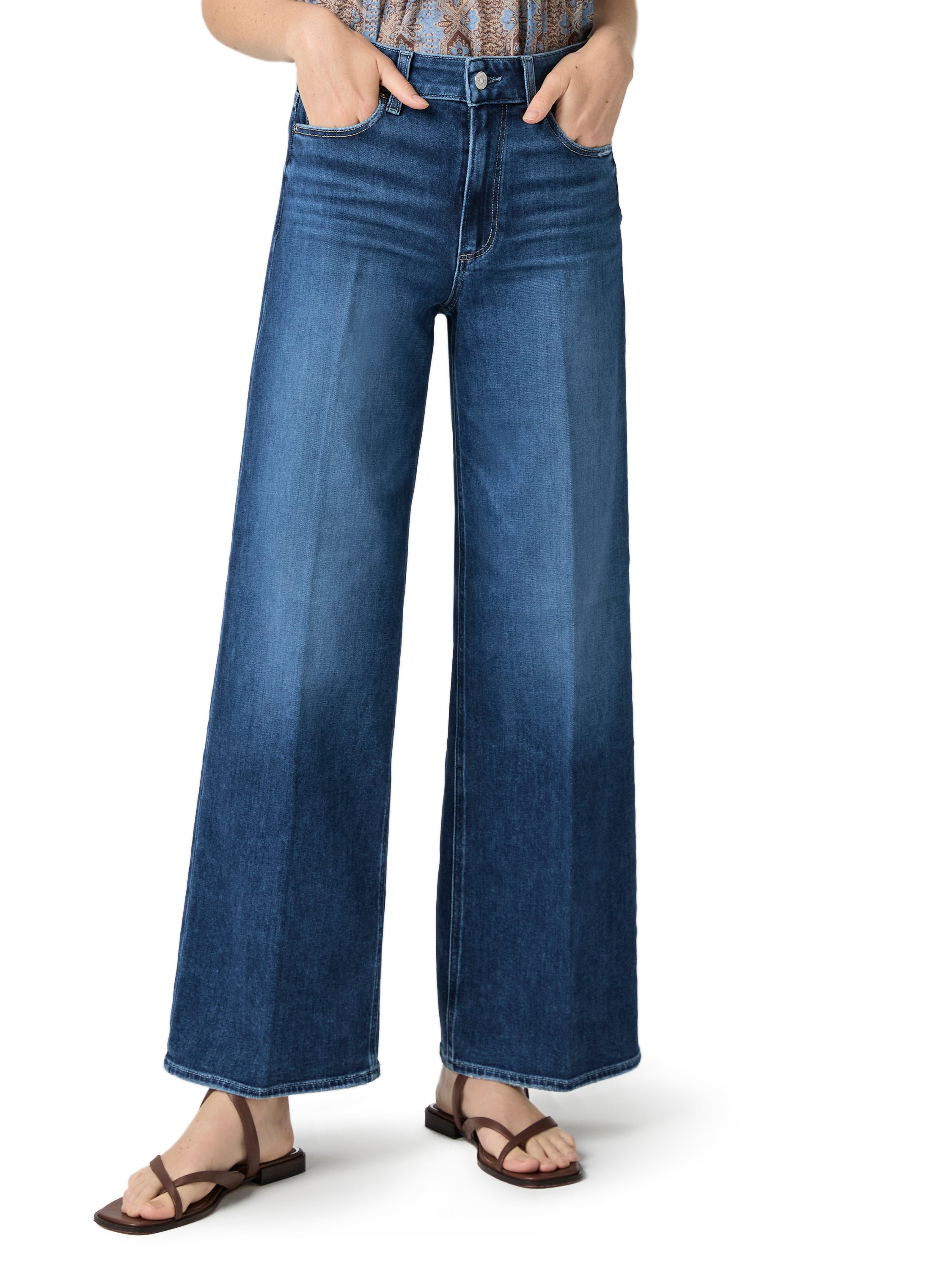 Cropped high-rise blue denim jeans featuring an ultra-wide, structured leg in a medium wash.