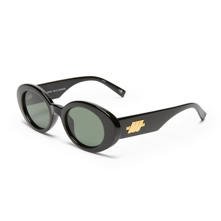 Black chunky oval sunglasses feature dark green lenses and a signature gold logo on the wide arms.