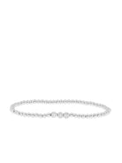 Silver beaded bracelet with three central sparkling silver-toned beads.