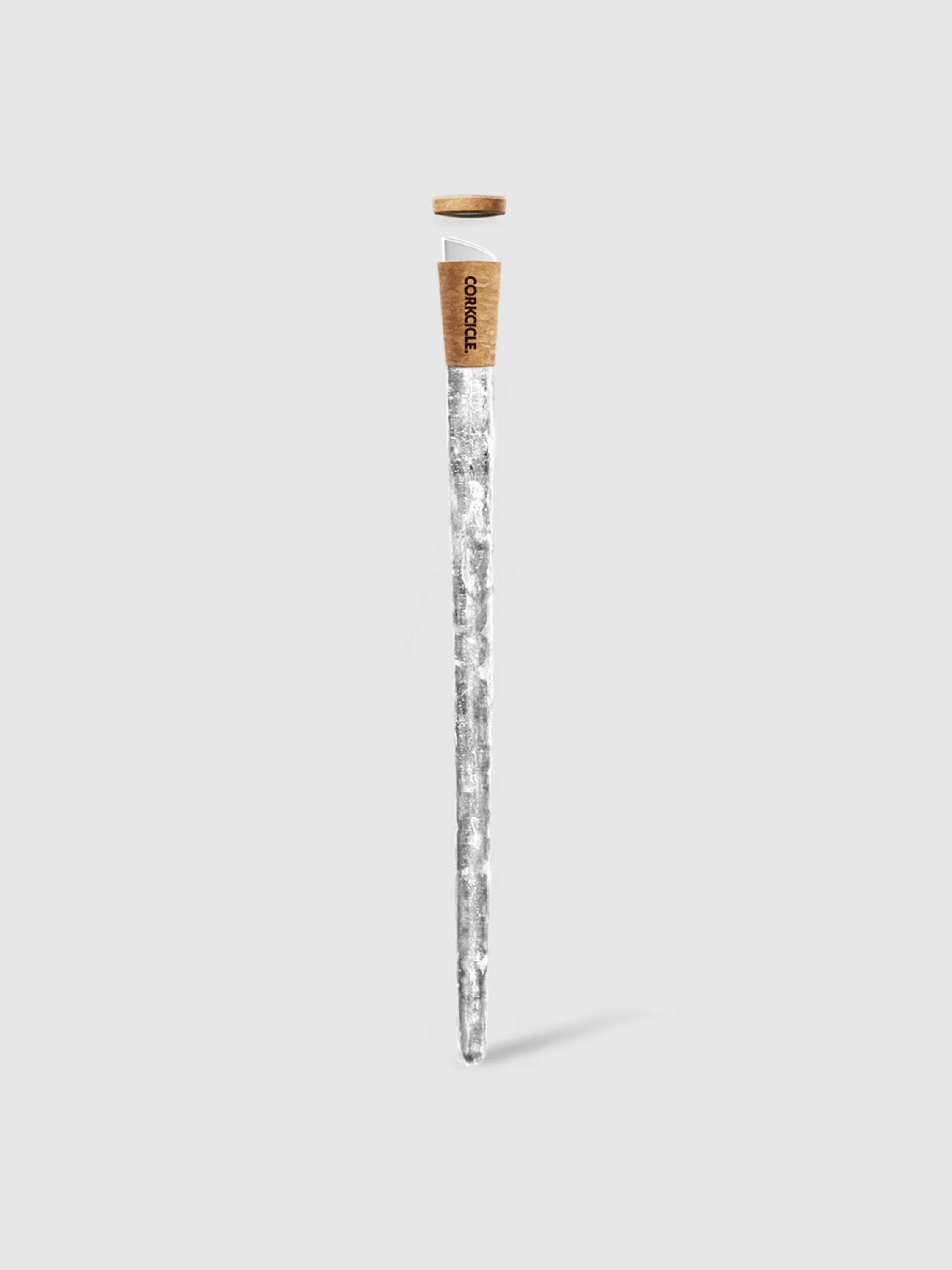 Silver bottle chiller with wood and white top. Long, slender design with textured silver body.