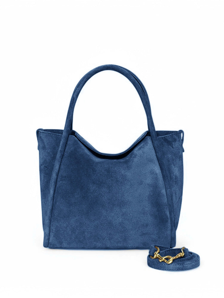 Dark blue suede satchel bag with matching shoulder strap and gold clasp. Top handles.