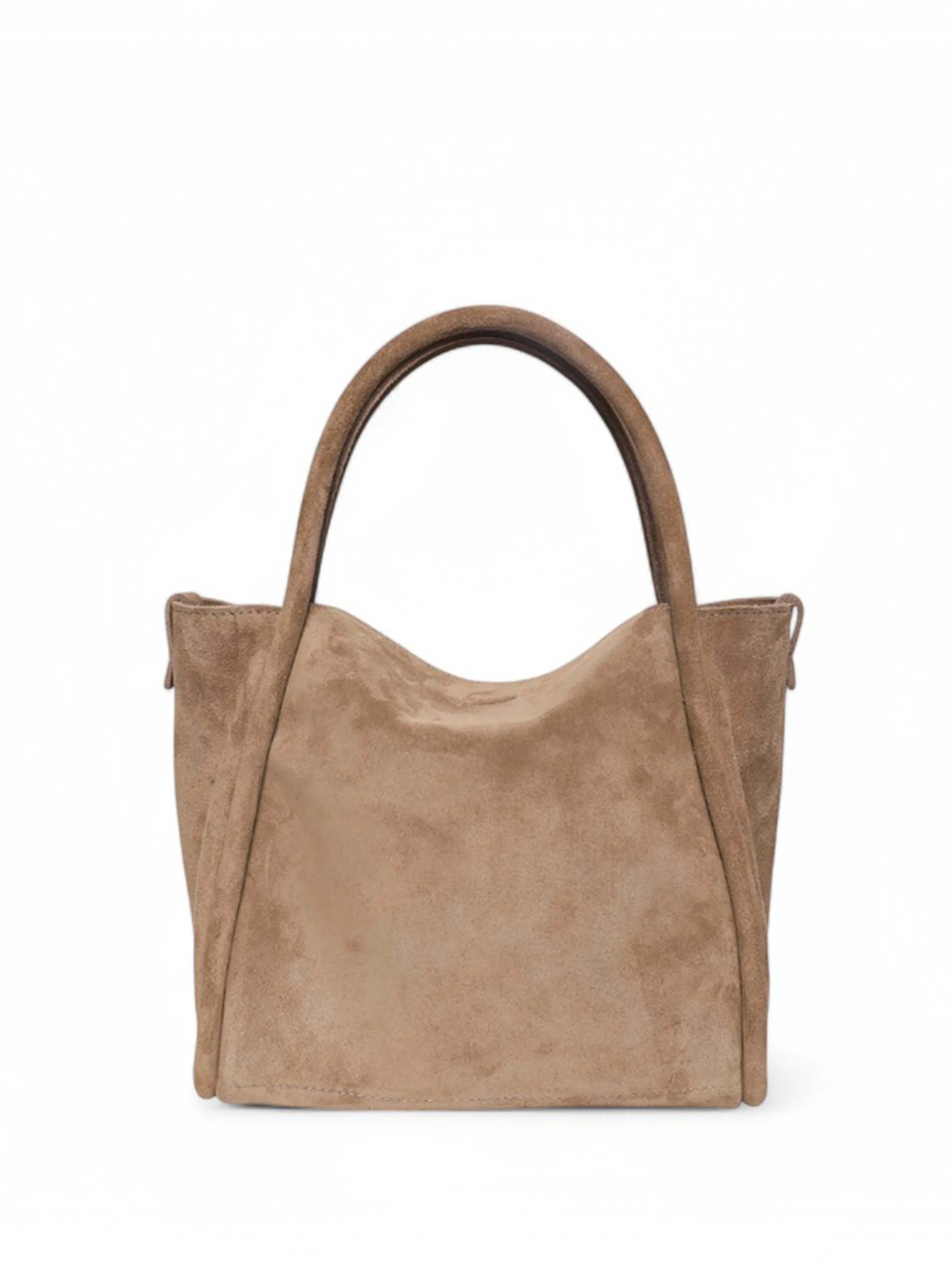 Light brown suede satchel bag with top handles. Structured, slightly slouchy shape.