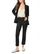 Black coated straight-leg pants with a subtle sheen, cropped at the ankle.