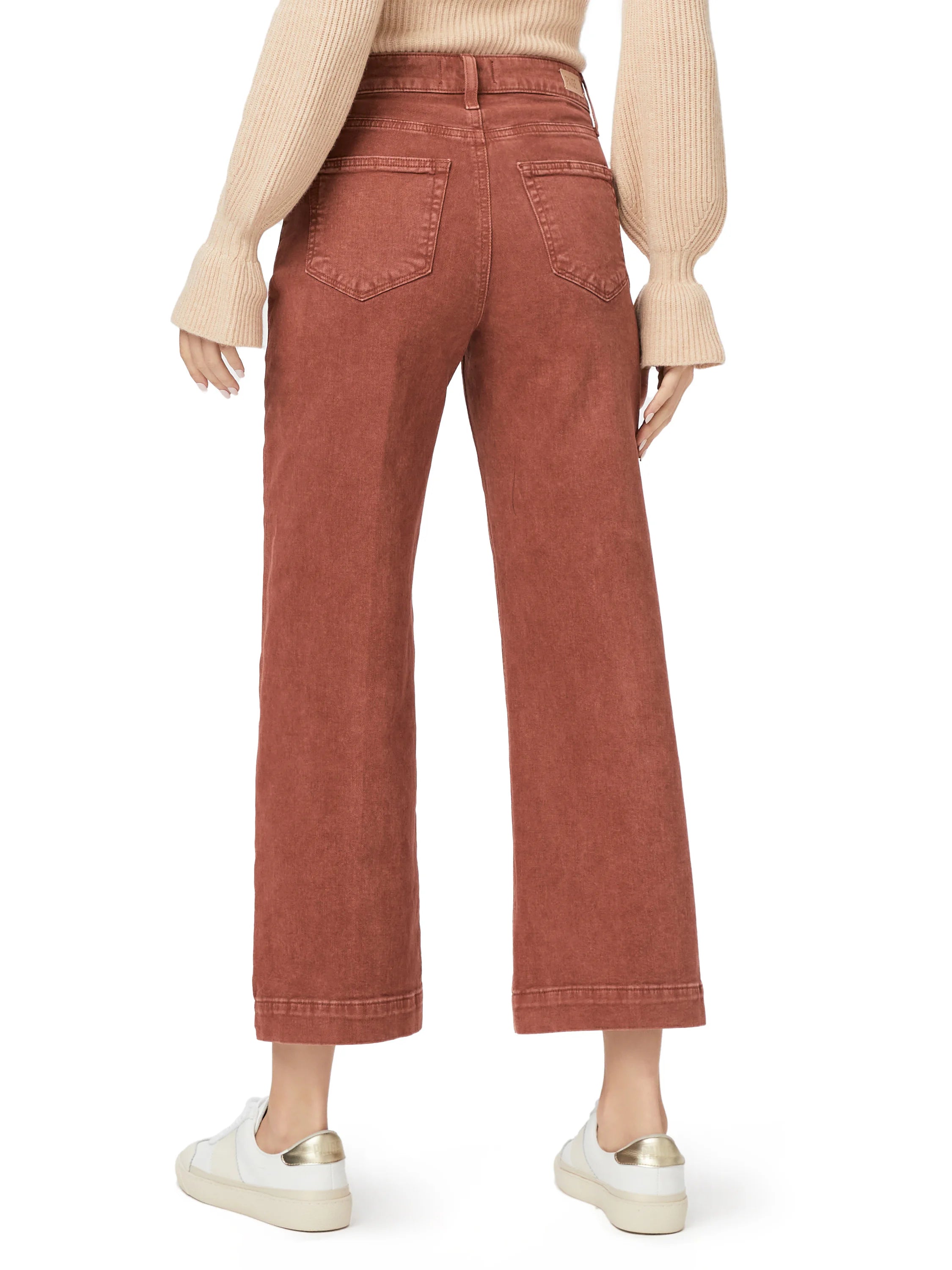 Rust wide-leg jeans, cropped length, seen from the back with pockets.