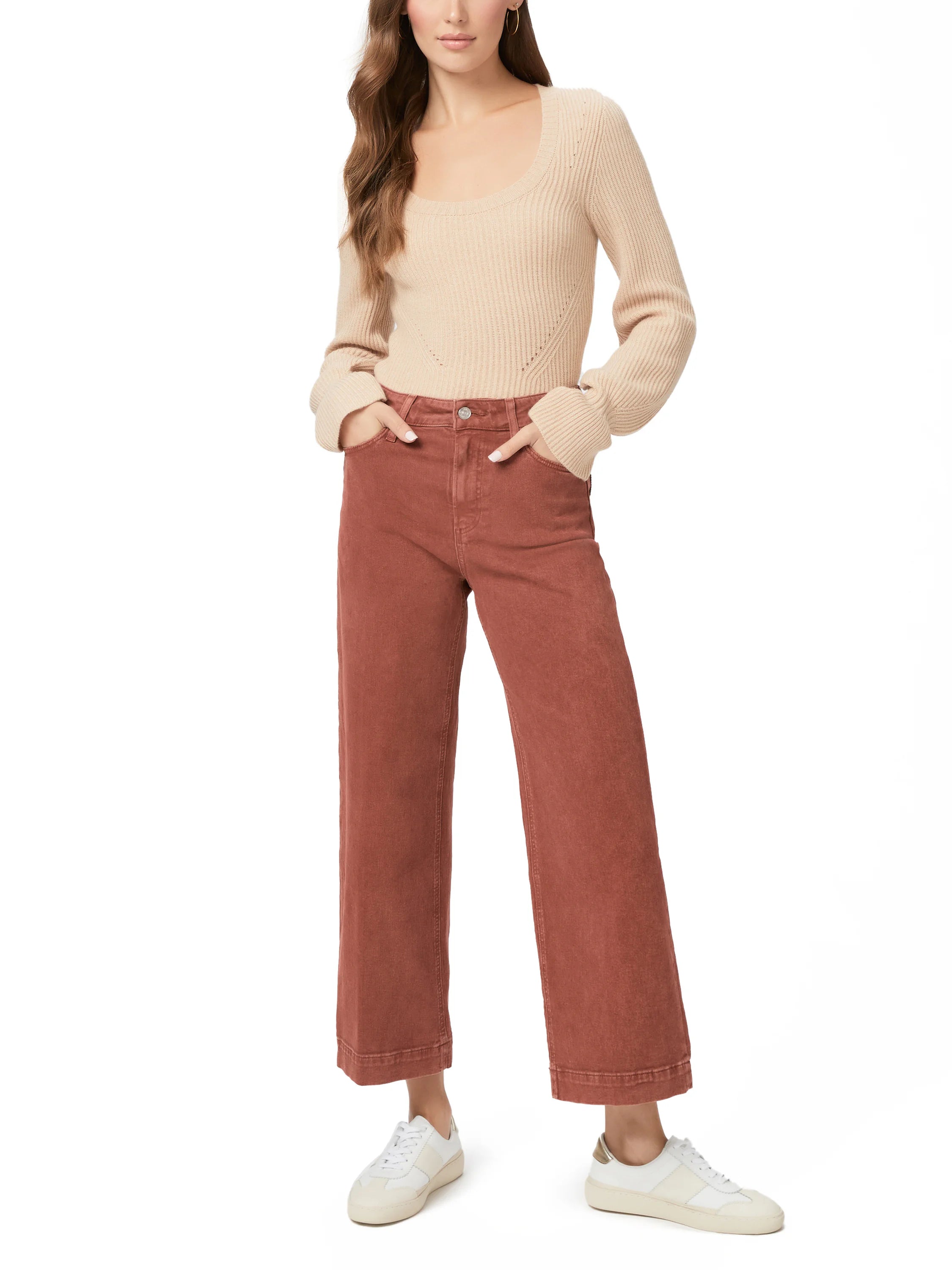 Dusty rose wide-leg jeans; model wears neutral beige top and white sneakers.
