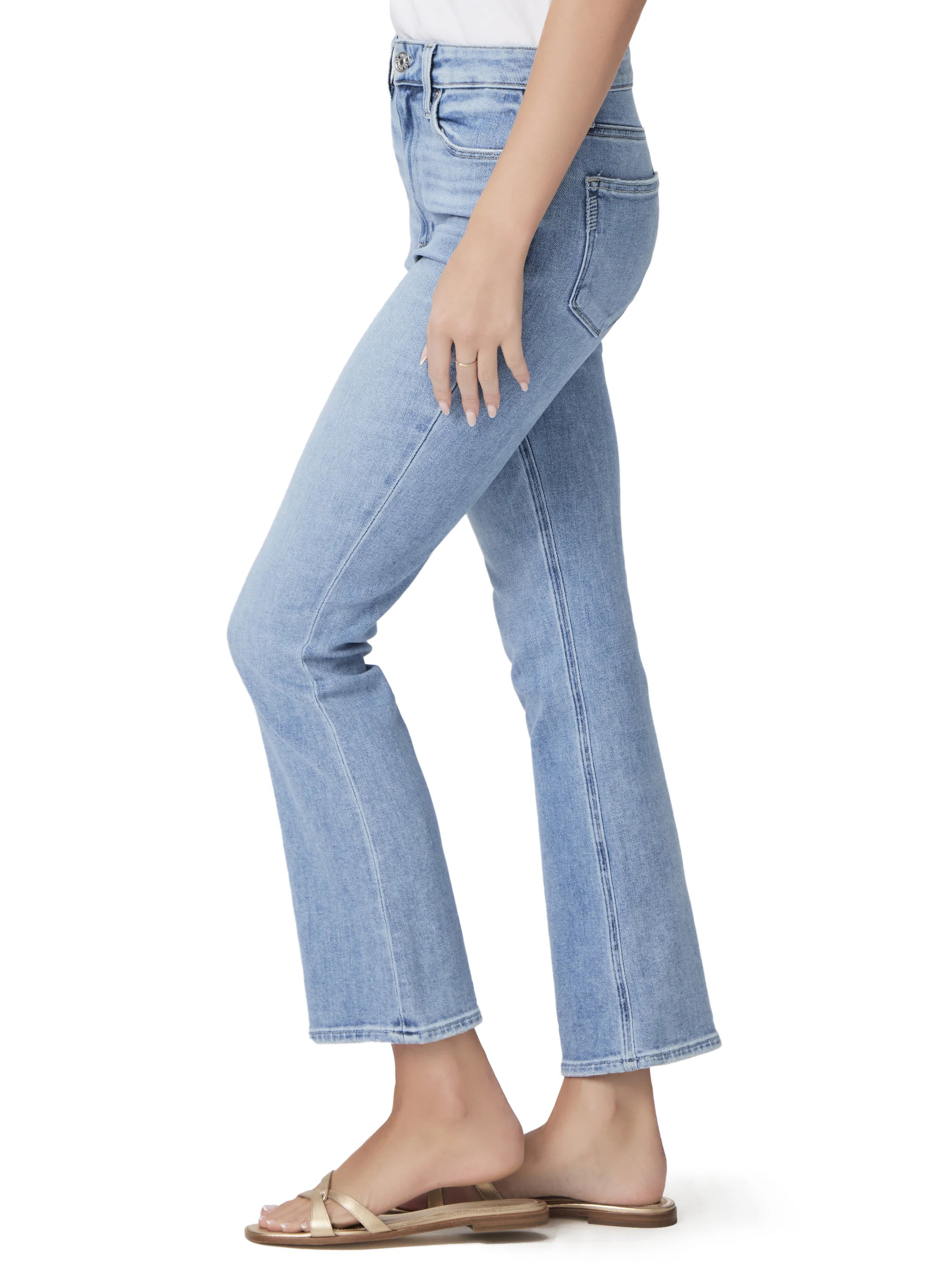 Light wash, ankle-flare jeans shown on a model. The jeans have a straight leg that flares slightly at the ankle.