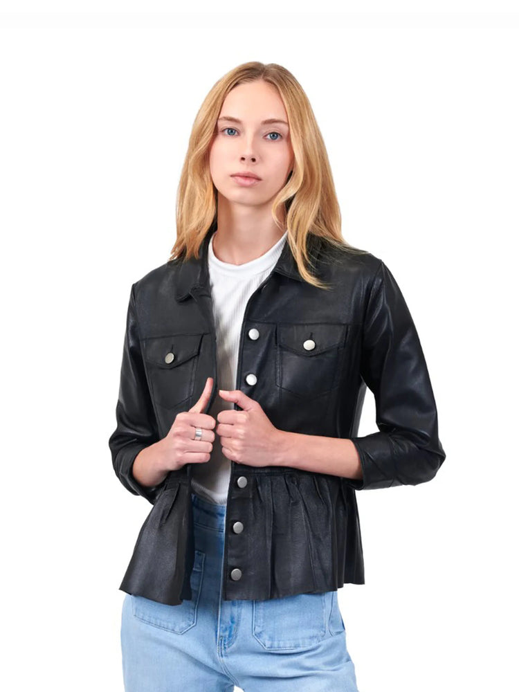 Black leather jacket with peplum hem and silver buttons. Model is wearing light blue jeans.
