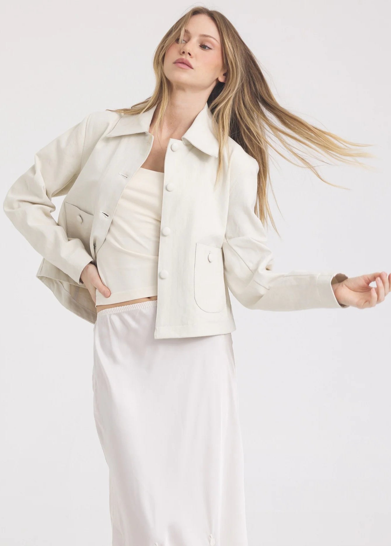 Off-white Julie jacket: cropped, collared, with front buttons & chest flap pockets.