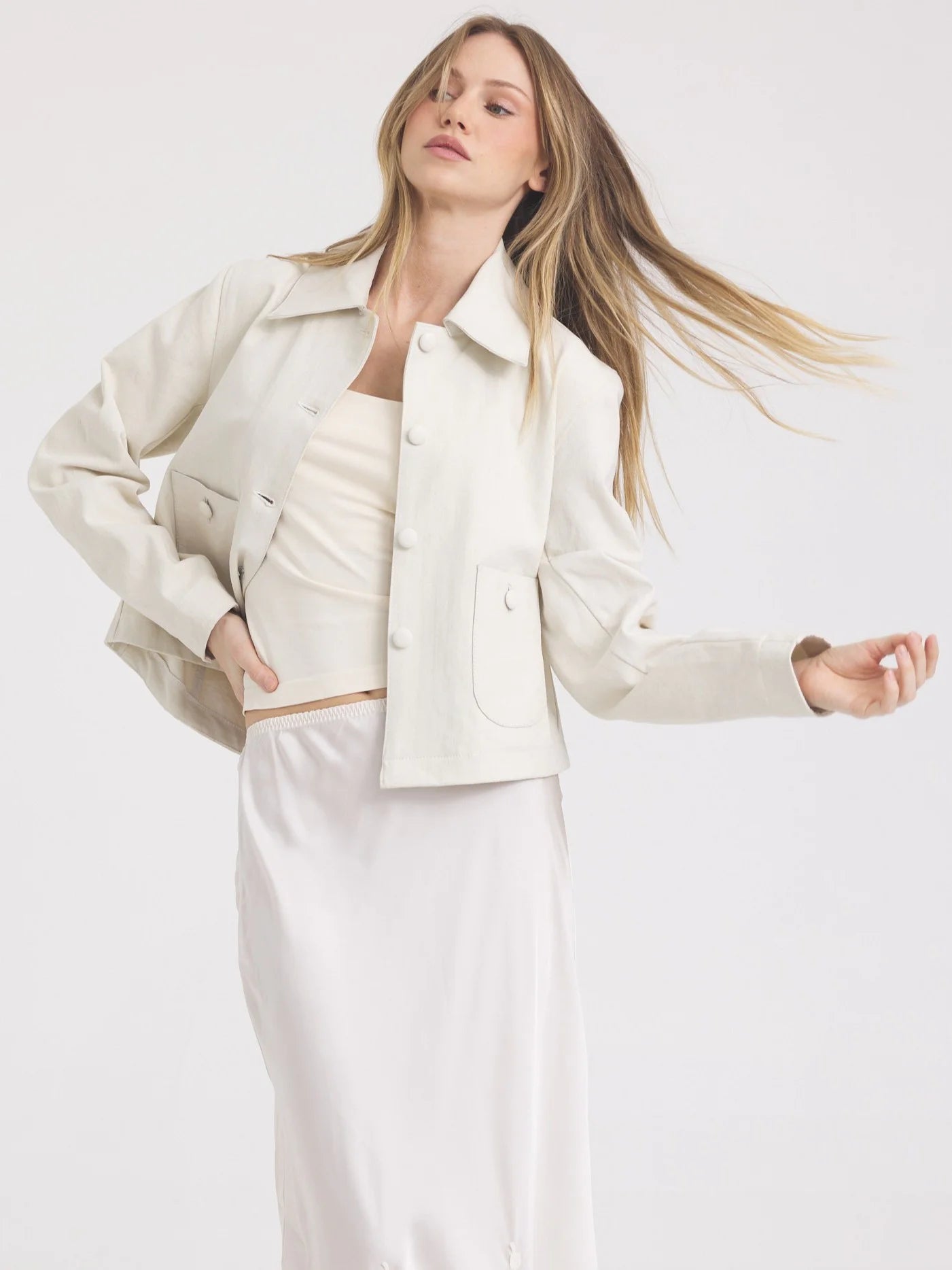 Off-white Julie jacket: cropped, collared, with front buttons & chest flap pockets.