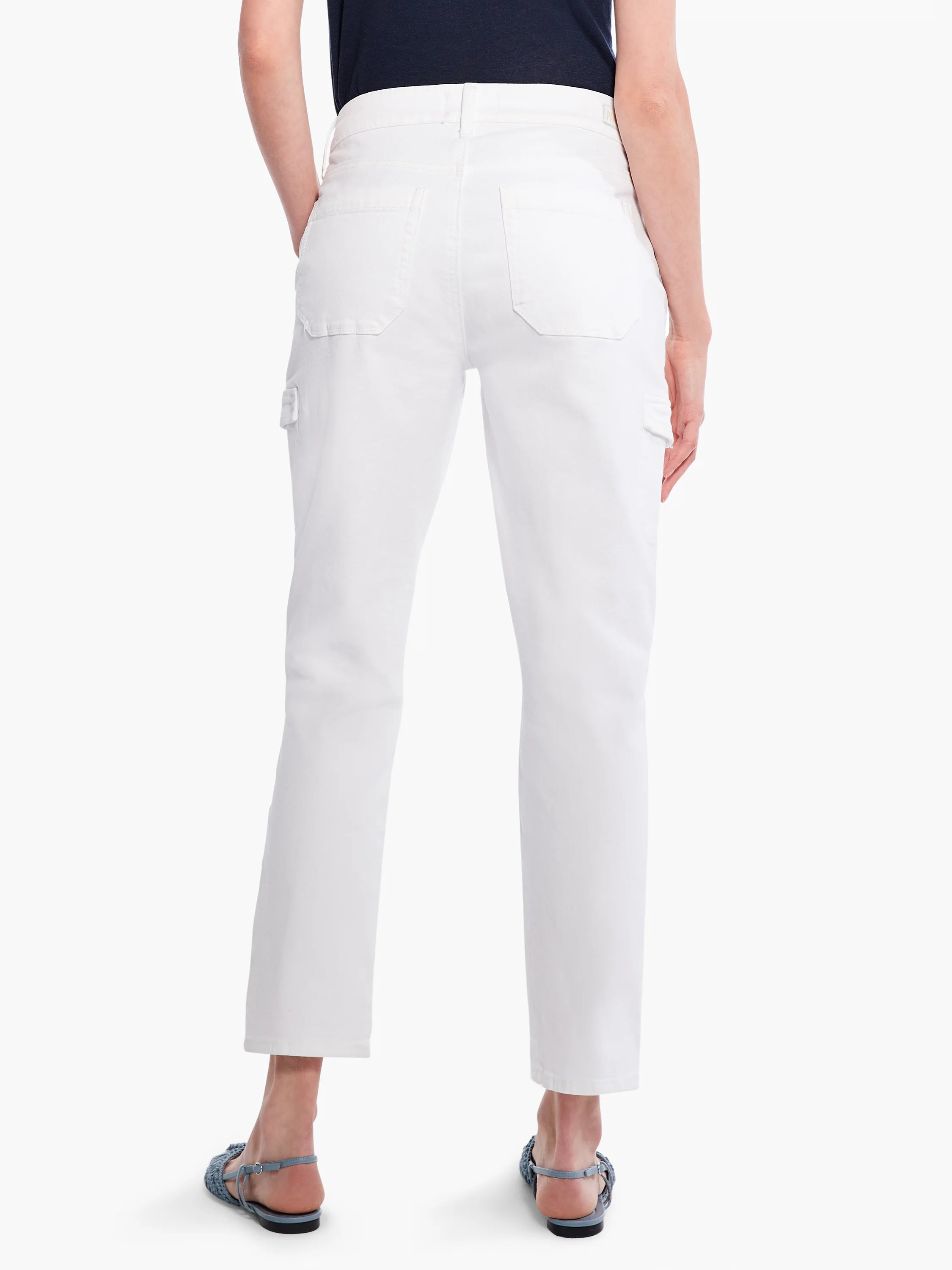 White pants with straight legs, ankle length. Features back patch pockets and side cargo pockets.