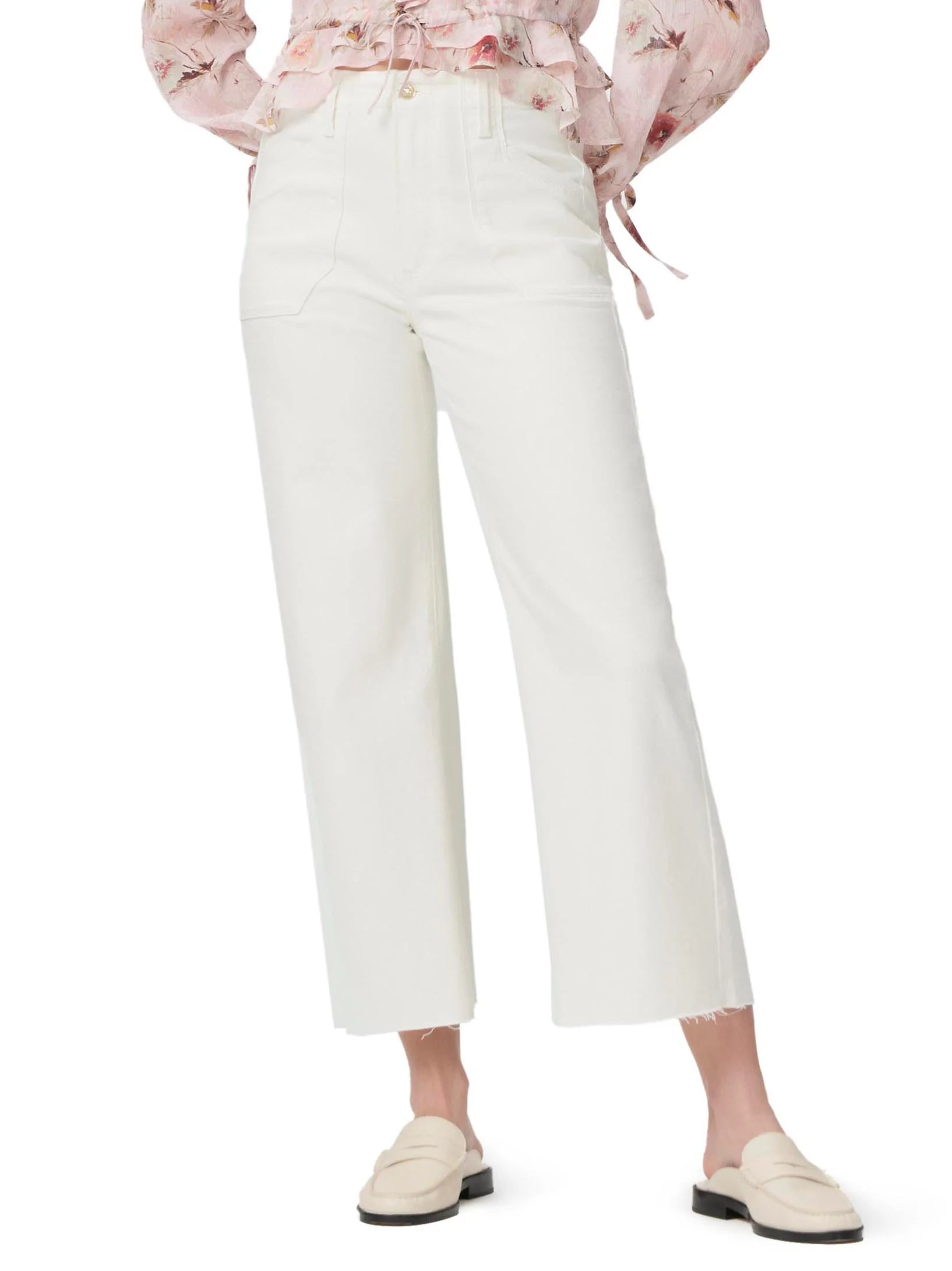 Off-white wide-leg jeans with utility pockets and a raw hem. Model wears off-white shoes.