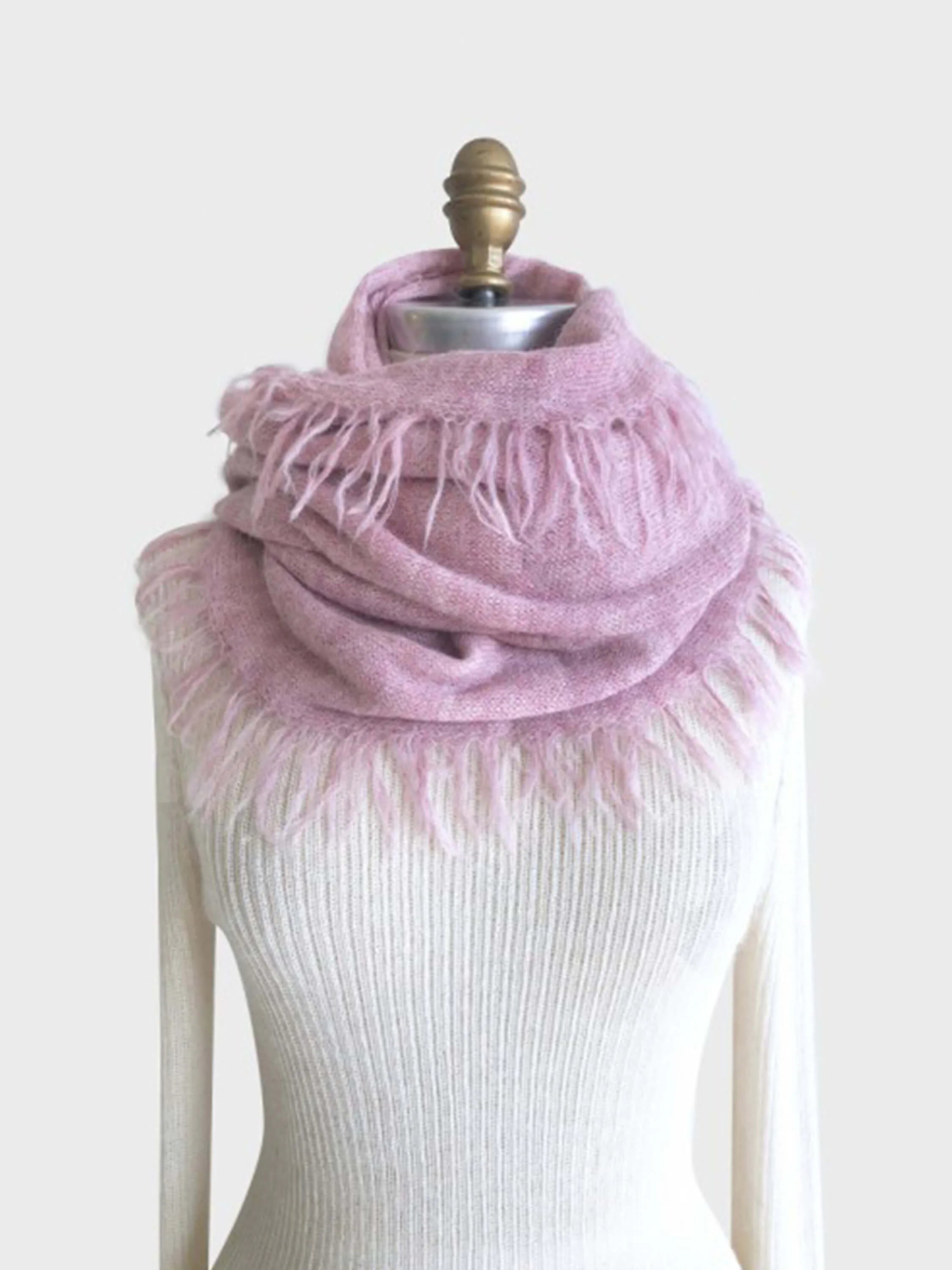 Dusty rose alpaca scarf with fringe. Shown draped on a mannequin.