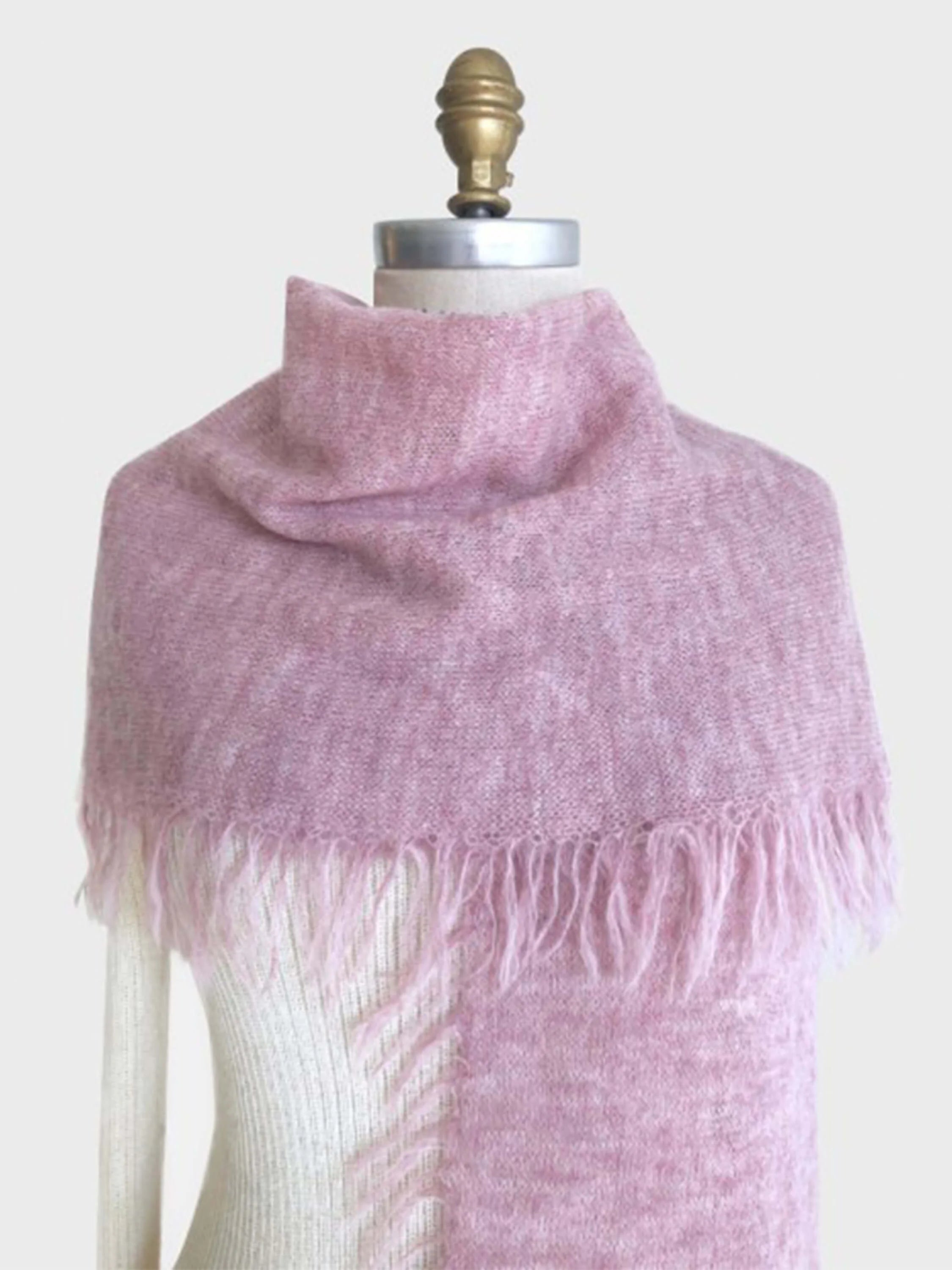 Dusty rose alpaca scarf with fringed edges. Soft, fuzzy texture.