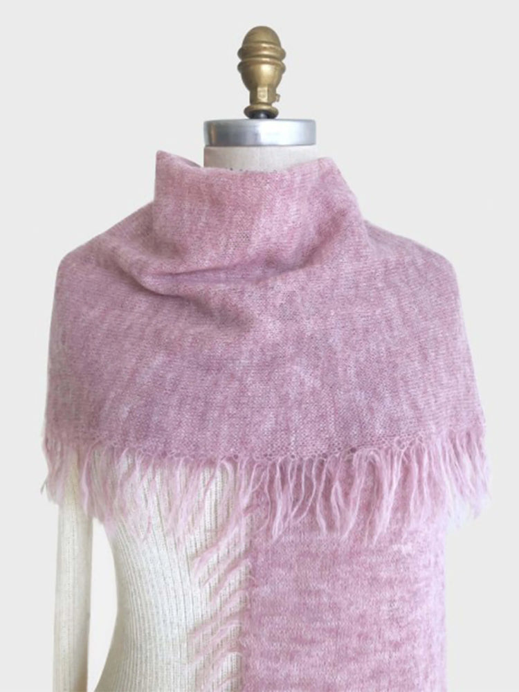 Dusty rose alpaca scarf with fringed edges. Soft, fuzzy texture.