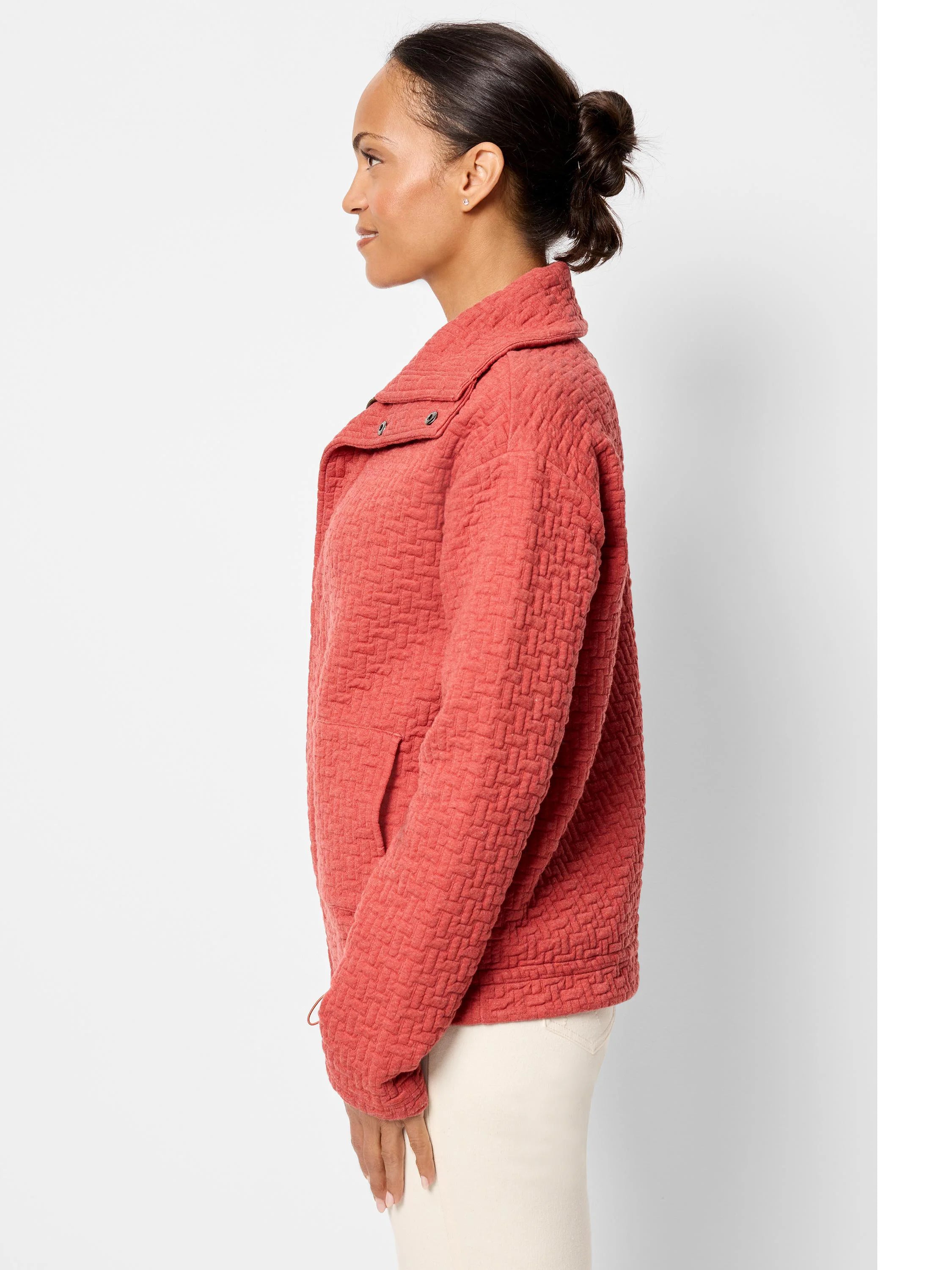Dusty rose quilted jacket. Textured, brick-like pattern. Asymmetrical collar, snap closure.