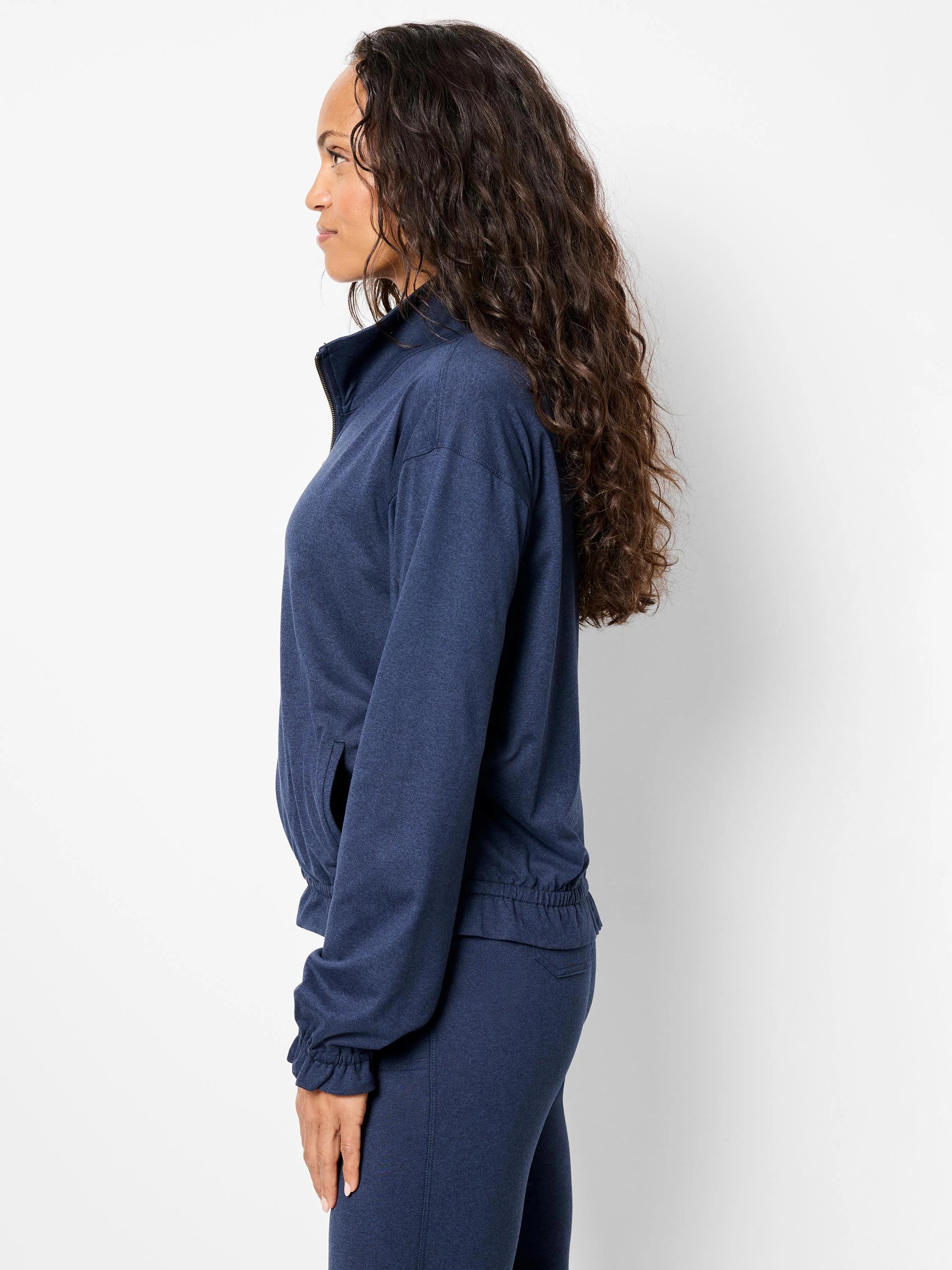 Here's alt text for the image, under 125 characters:
Dark blue zip-front jacket with elastic cuffs and hem. Side...
