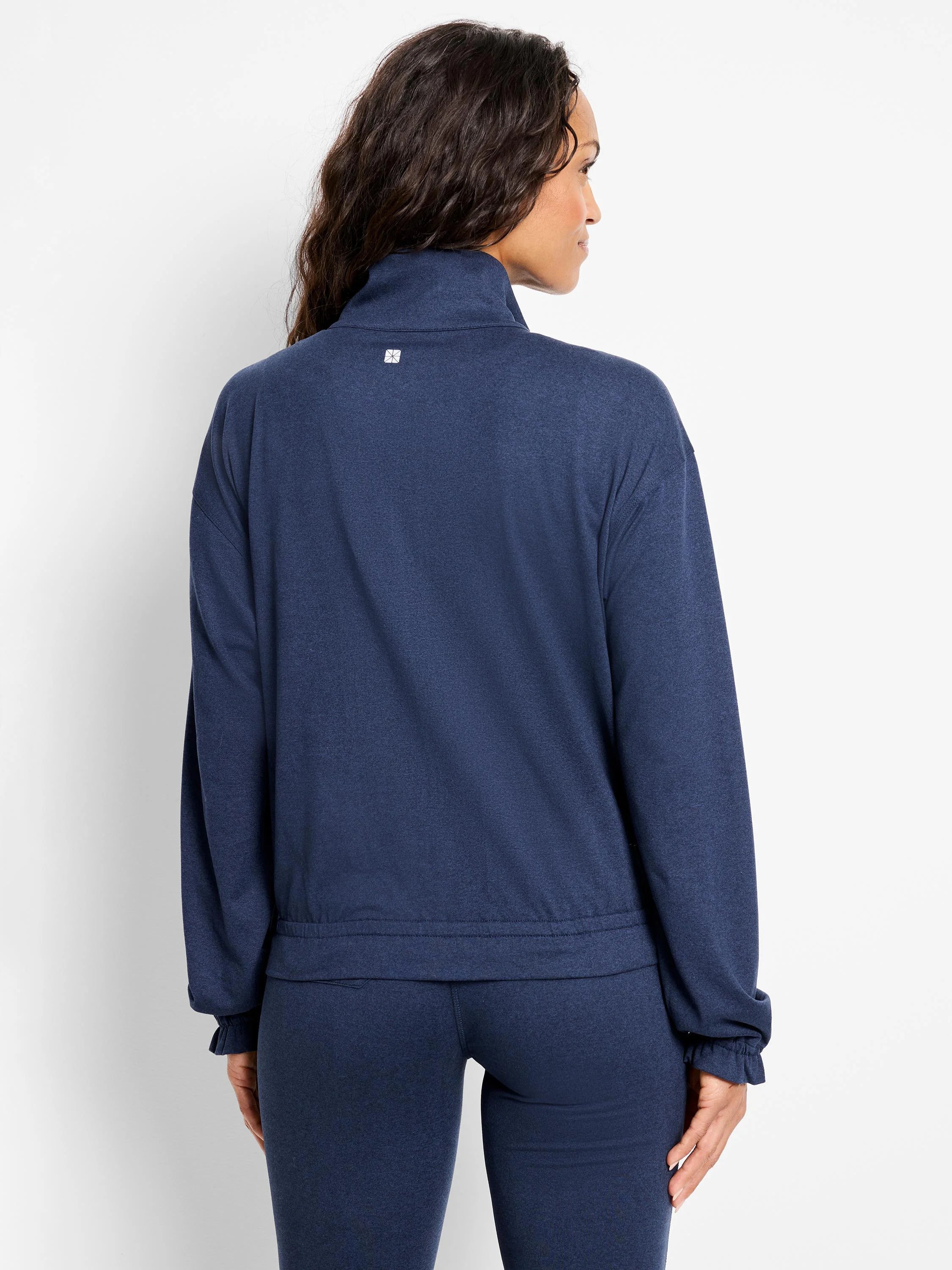 Here's alt text under 125 characters:
Dark navy blue zip-front jacket. Long sleeves with elastic cuffs. Elastic...