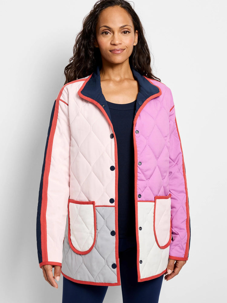 Quilted, color-blocked coat: light pink, magenta, grey, white panels with navy collar and coral trim.