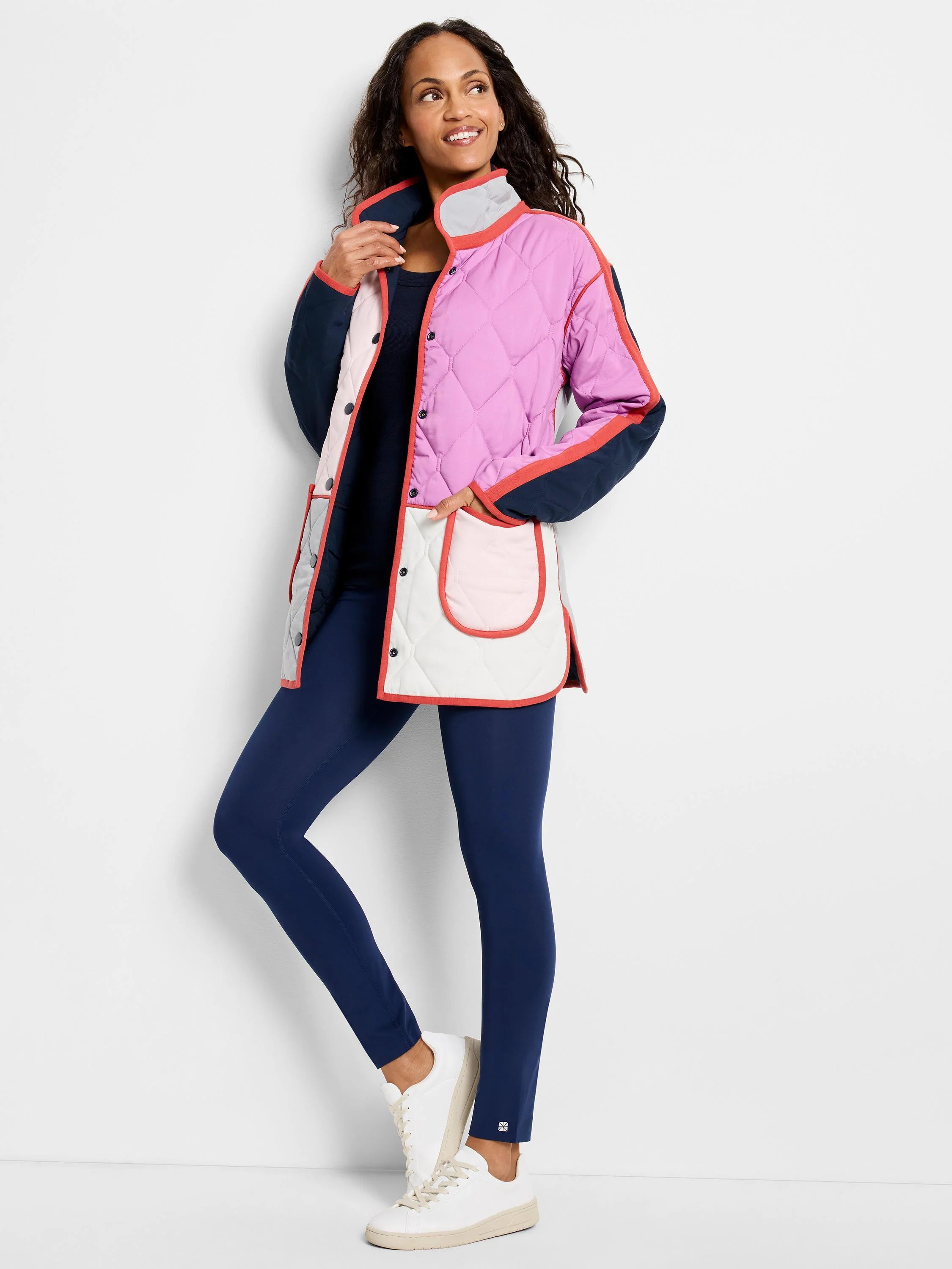 Diamond-quilted, color-blocked coat: pink, navy, cream panels, coral trim, grey collar, pink patch pockets.