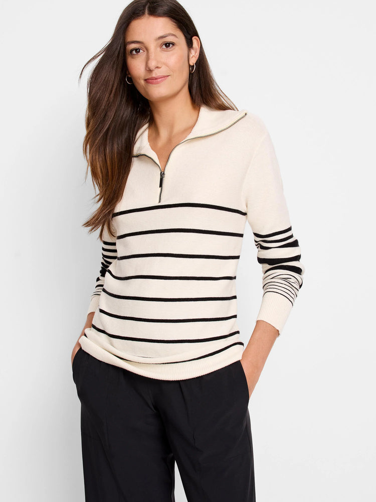 Cream-colored sweater with black horizontal stripes, half-zip closure. Long sleeves with striped cuffs.