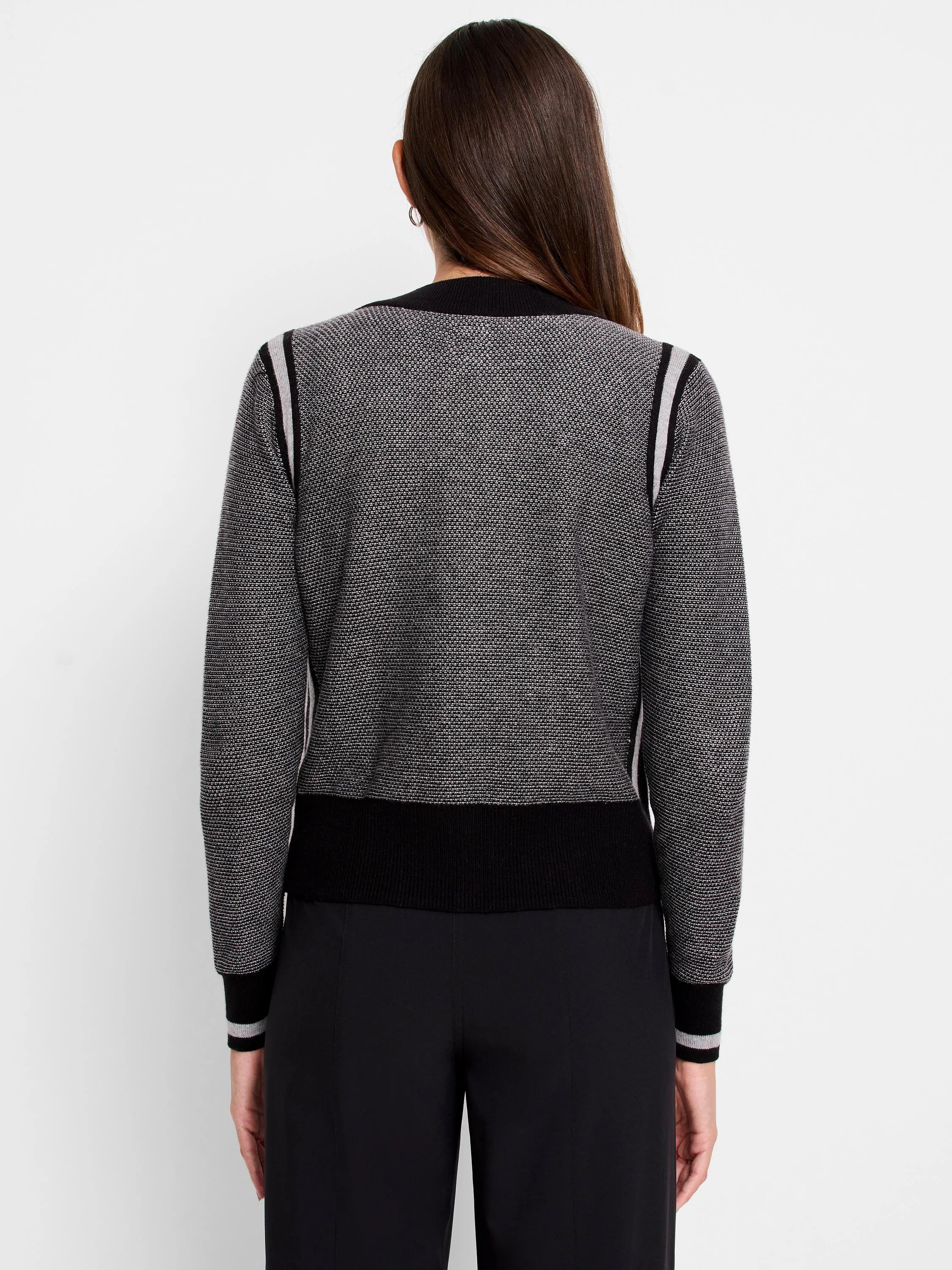 Gray textured zip-front cardigan with black and light gray stripes on the sleeves and shoulders. Black bottom band.