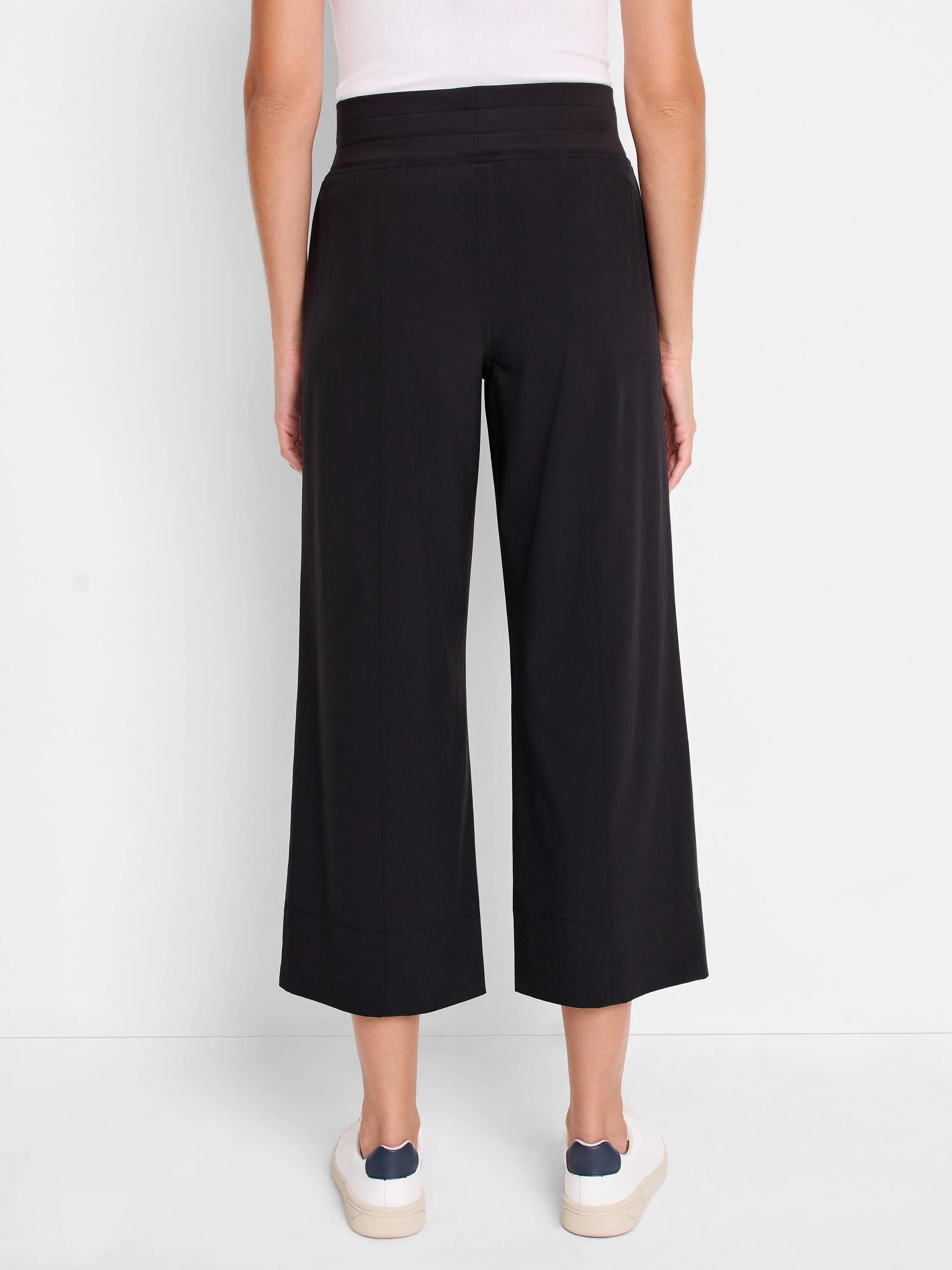 Black wide-leg cropped pants with a wide elastic waistband. The pants have a slight hem at the bottom.