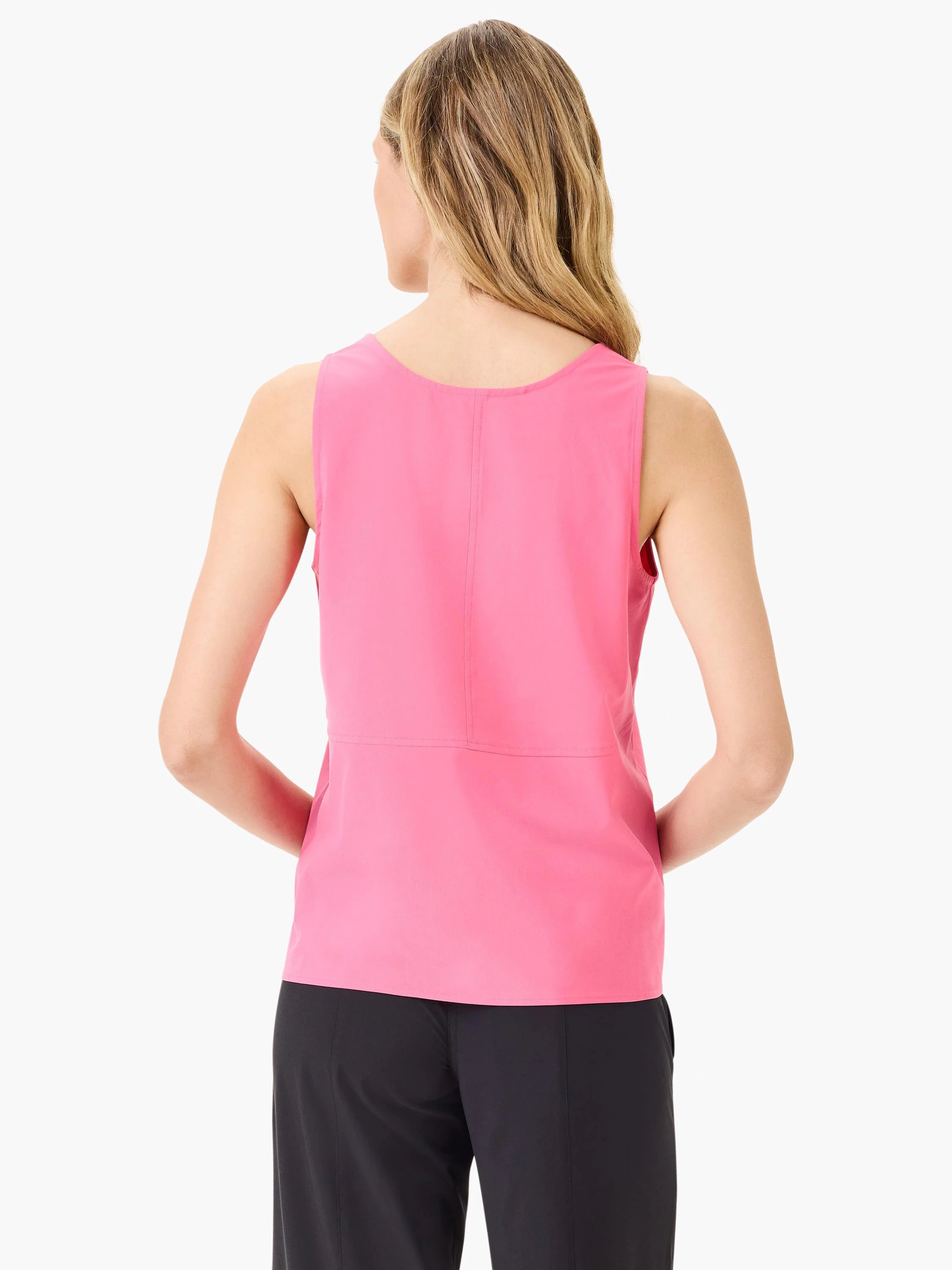 Pink sleeveless tank top, back view. Seams visible at center back and waist.