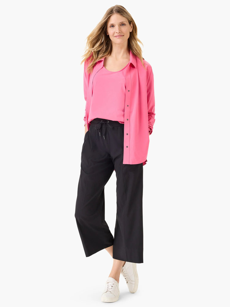 Black wide-leg cropped pants; drawstring waist. Model wears hot pink shirt.