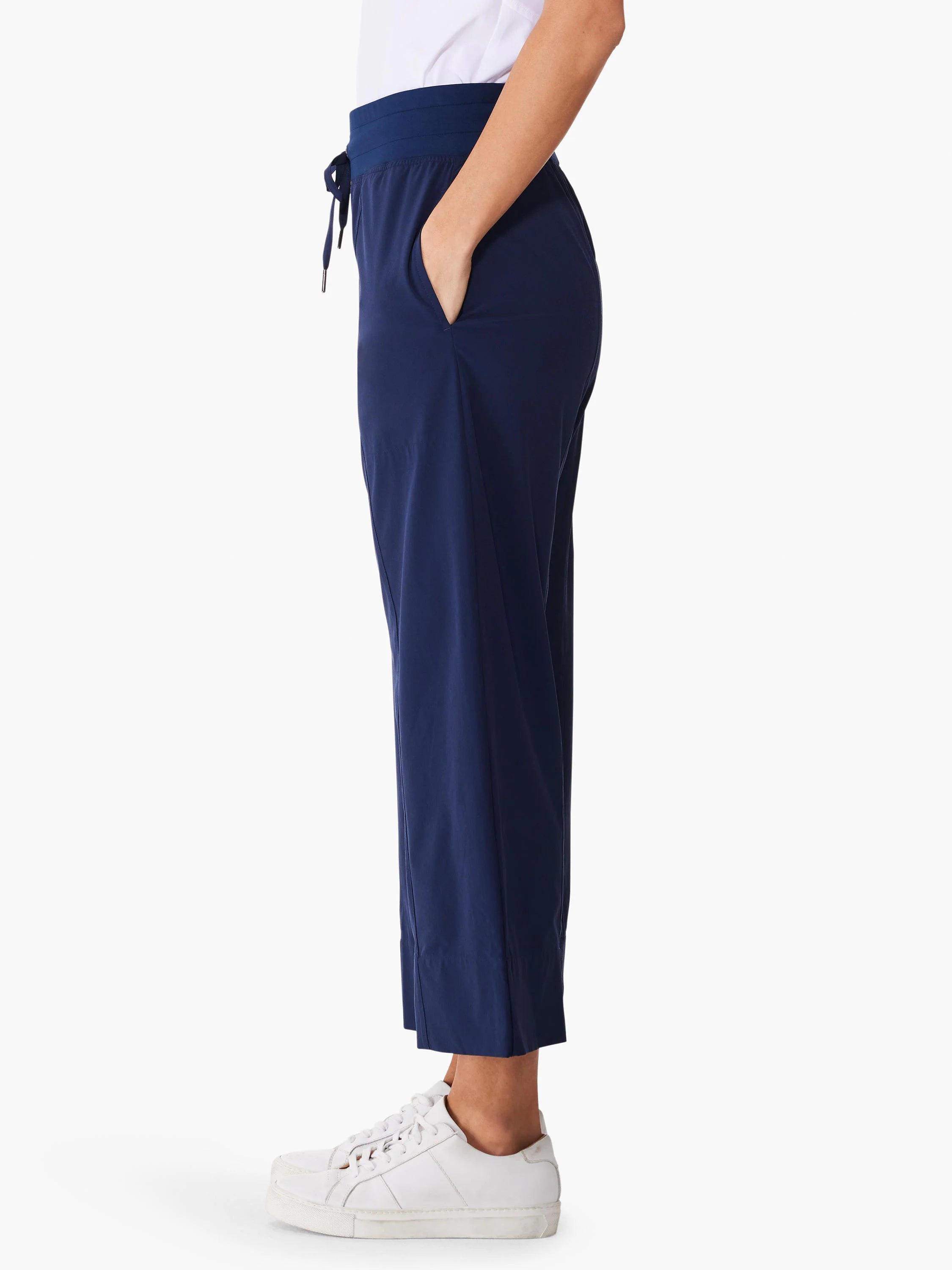 Navy blue wide-leg cropped pants; elastic waistband with drawstring. Side pockets.