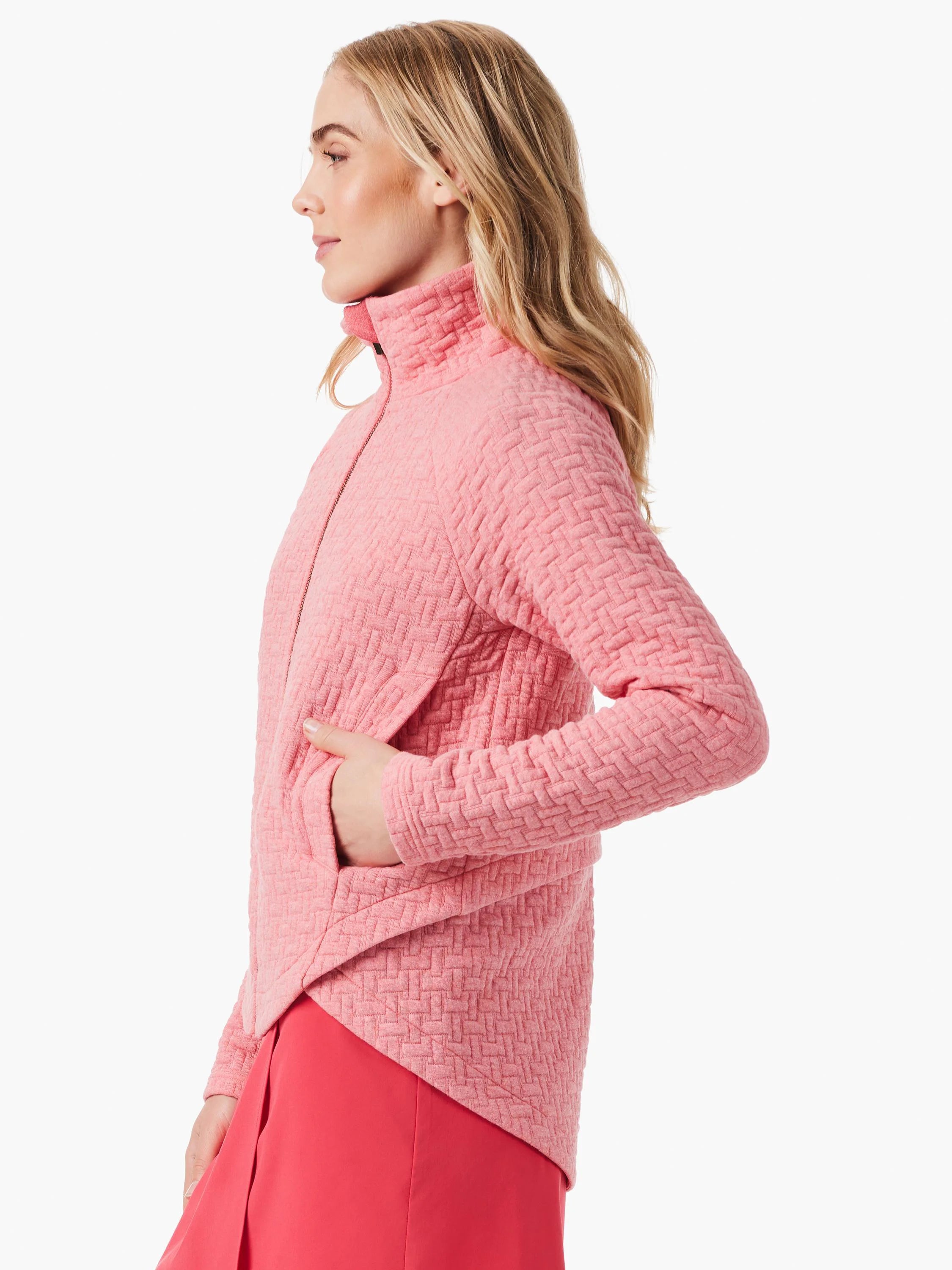 Pink quilted jacket with zipper and pockets. A textured, woven pattern.