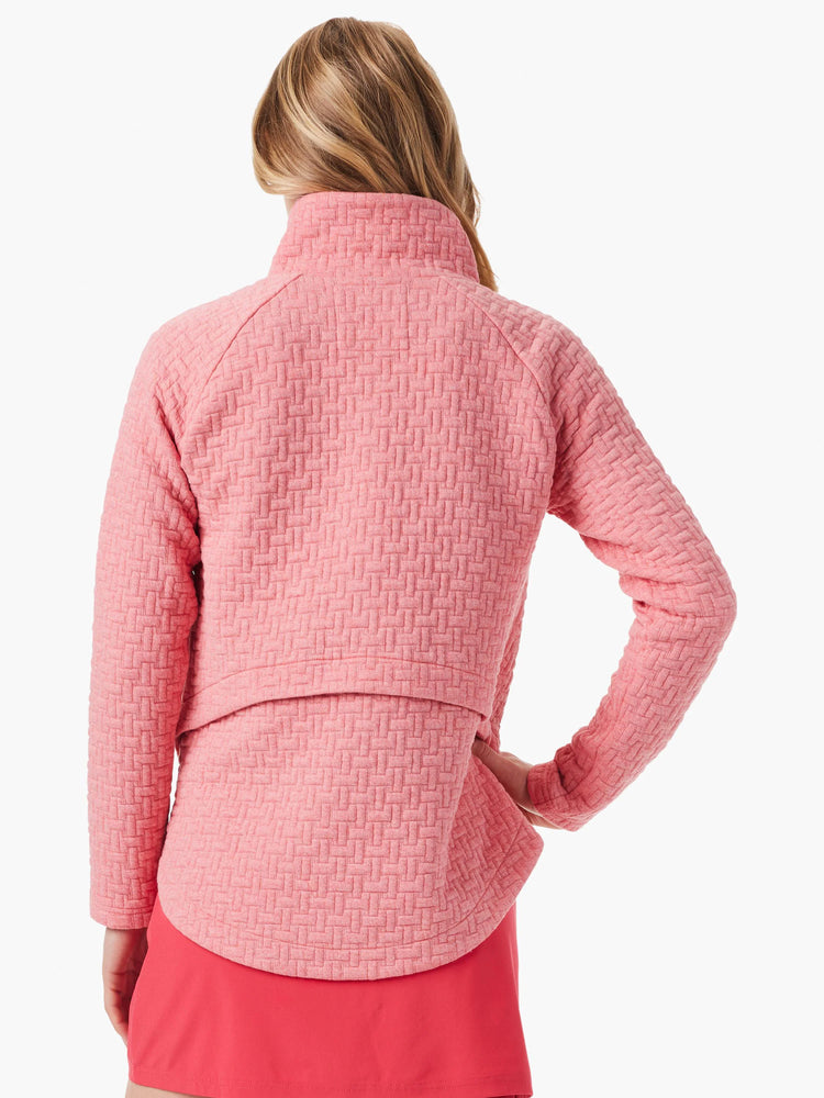 Rose-pink quilted jacket, long sleeves, mock neck. Textured, woven pattern.