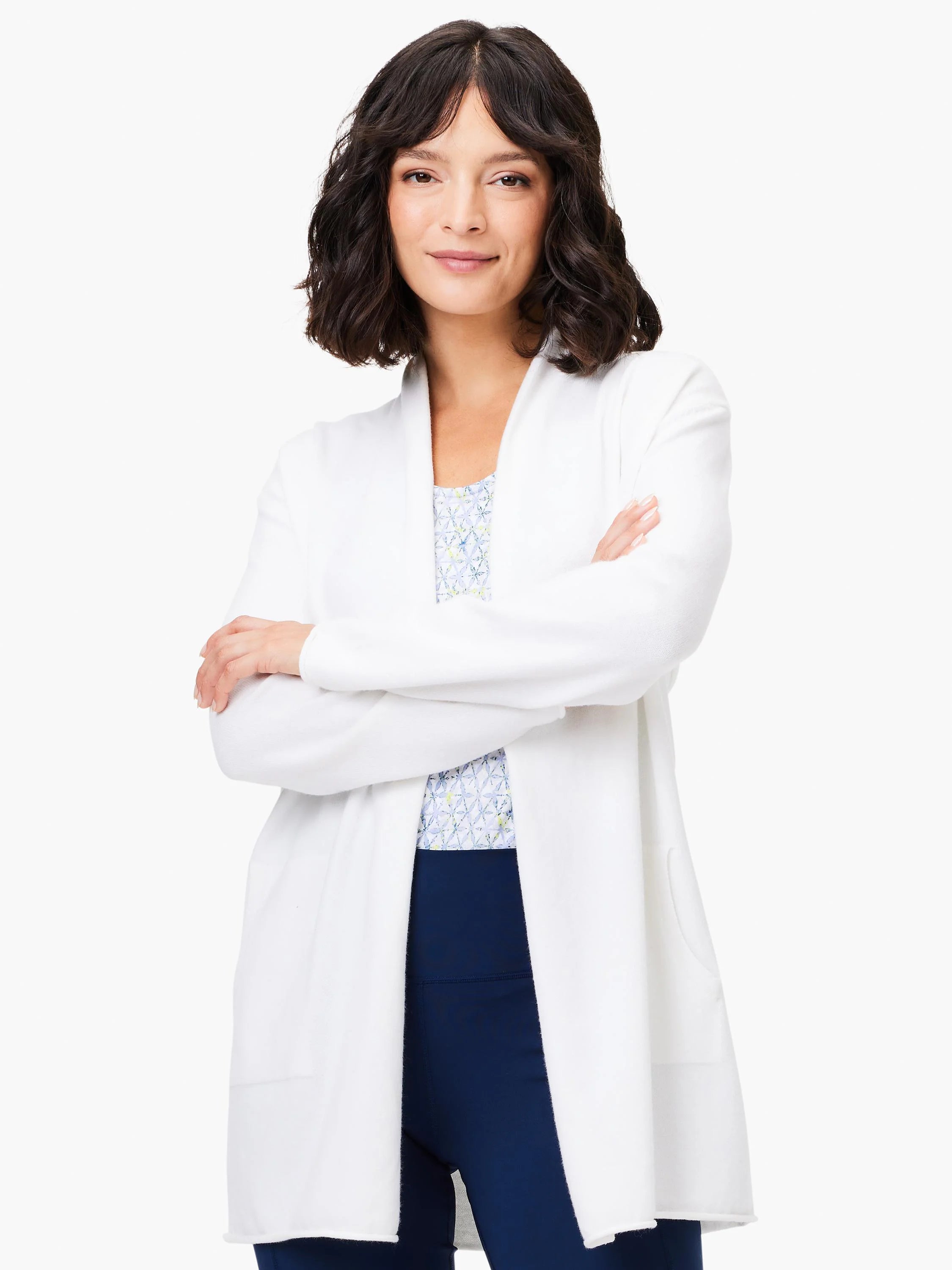 Off-white open-front cardigan with long sleeves, shown on model. The cardigan has a slightly textured appearance.