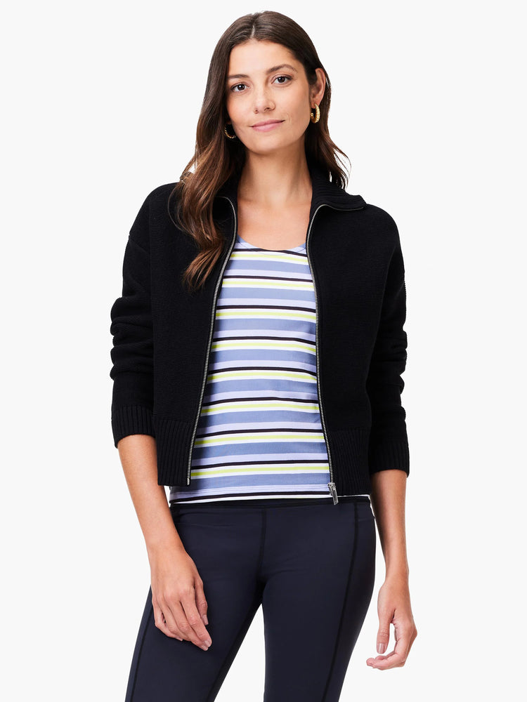 Black zip-front sweater jacket. Ribbed cuffs and hem. Silver zipper.