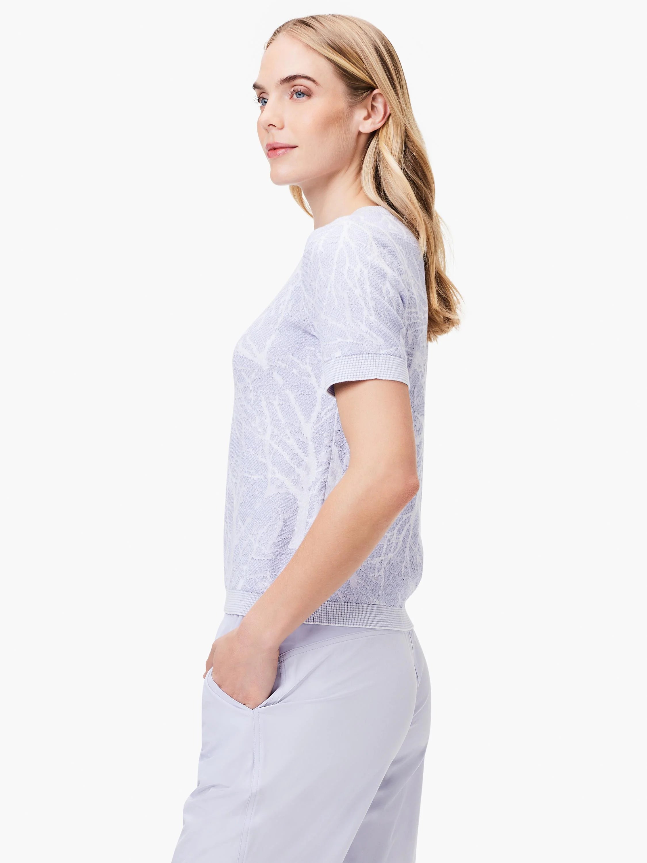 Lavender short-sleeve sweater tee with a textured, branch-like pattern.