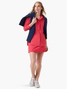 Reddish-orange long-sleeved collared Tech Stretch Shirt, button-front.