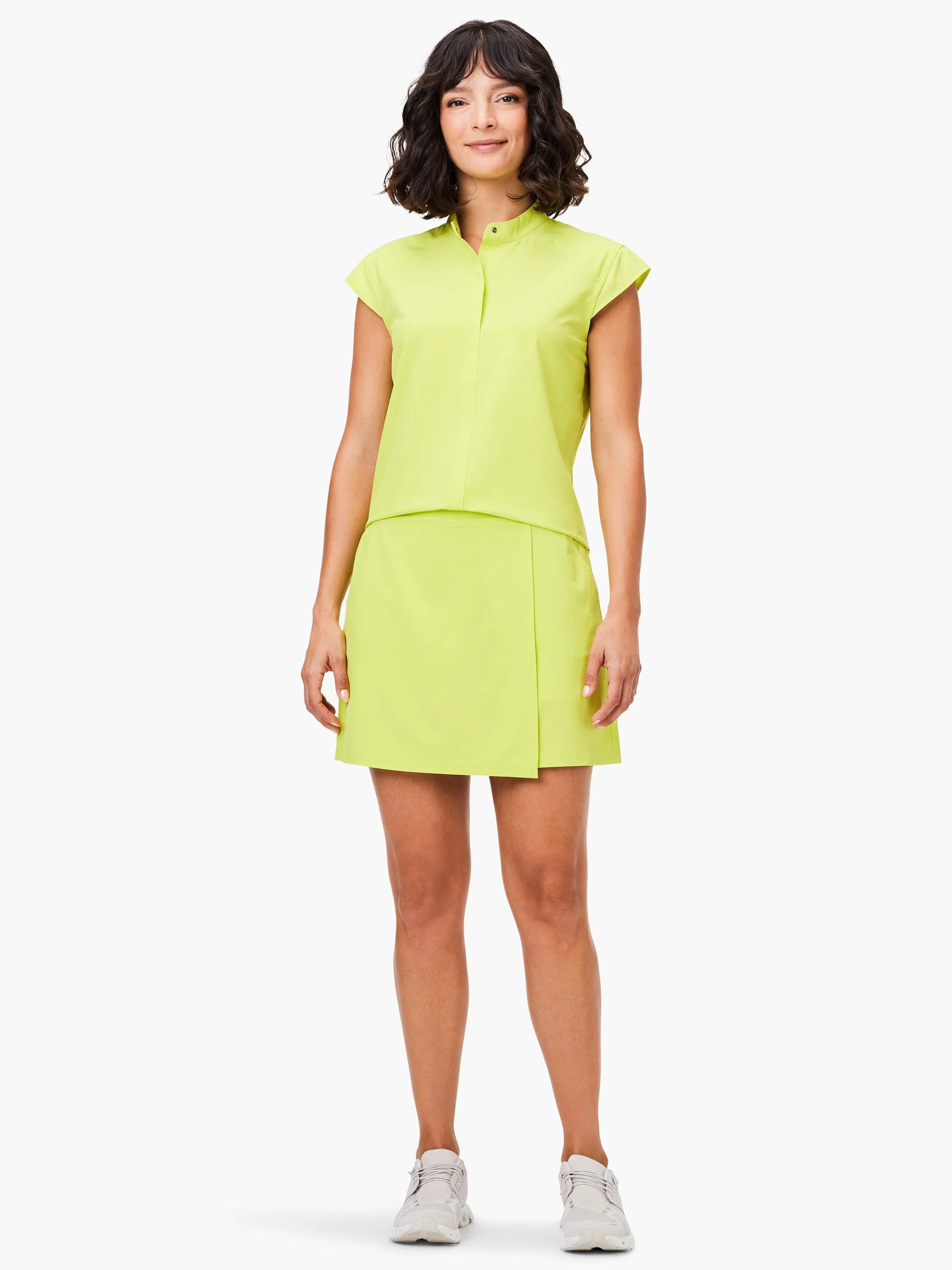 Lime green short-sleeved top and skort;  faux wrap style skort.