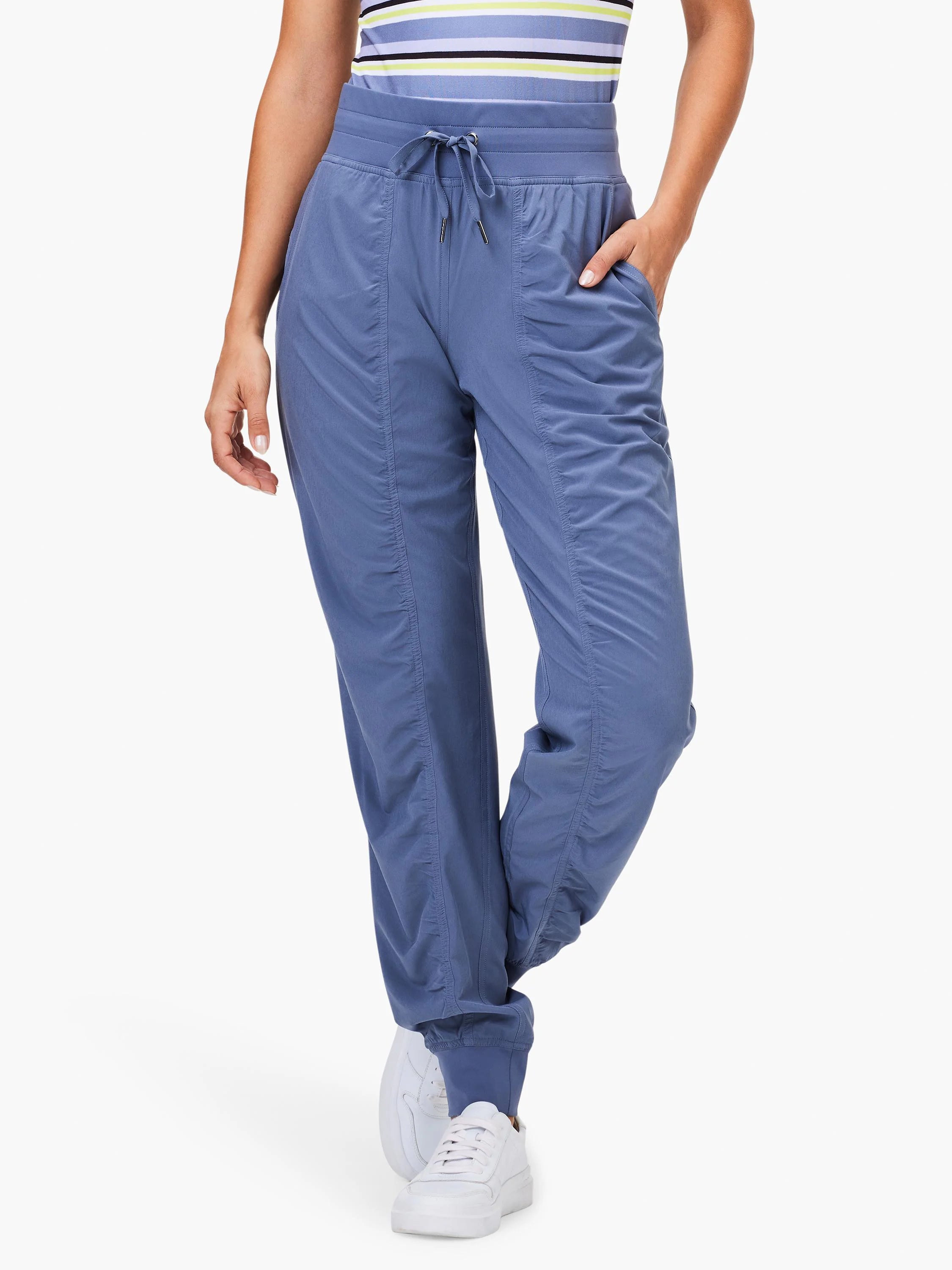 Periwinkle blue ruched joggers with a drawstring waist, side pockets, and elastic cuffs at the ankle.