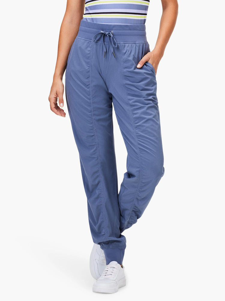 Periwinkle blue ruched joggers with a drawstring waist, side pockets, and elastic cuffs at the ankle.