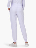 Light purple jogger pants, back view, showing a wide waistband and cuffed ankles.