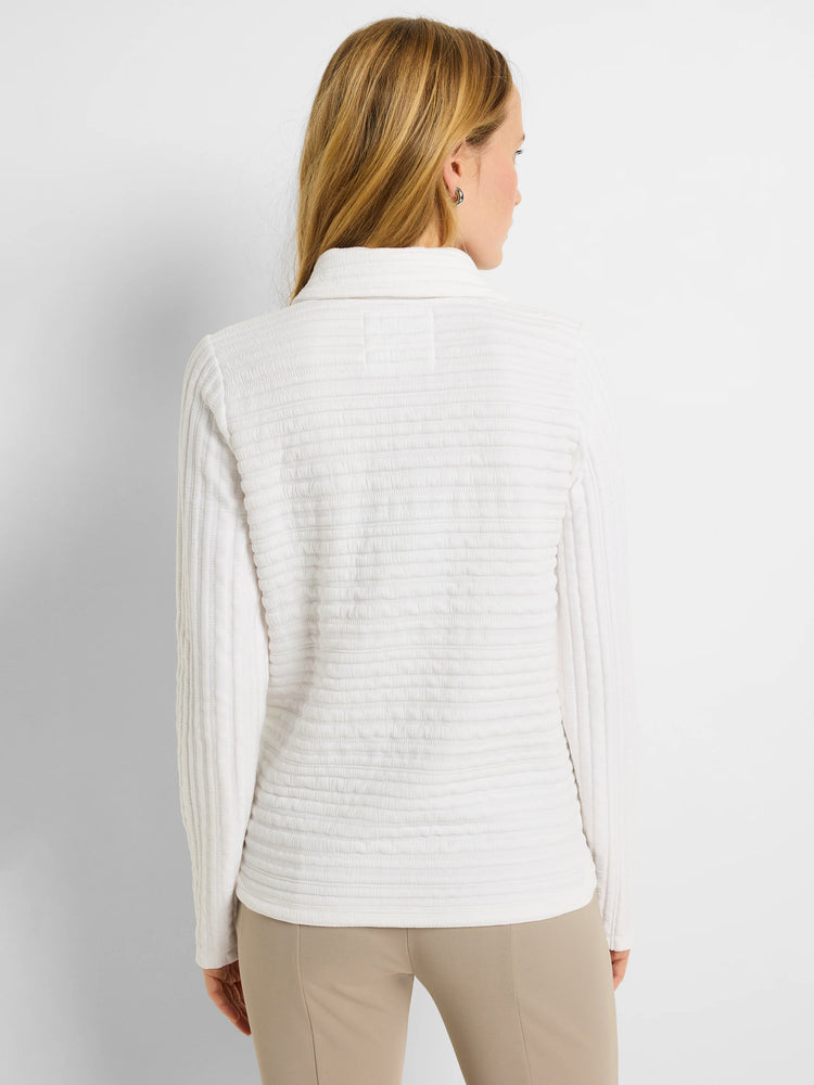 White polo shirt with textured horizontal stripes. Long sleeves, collared.