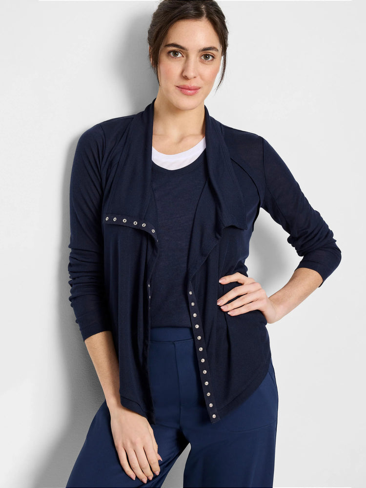 Navy blue gauzy cardigan with long sleeves and silver snap closures down the front. Open front drape.