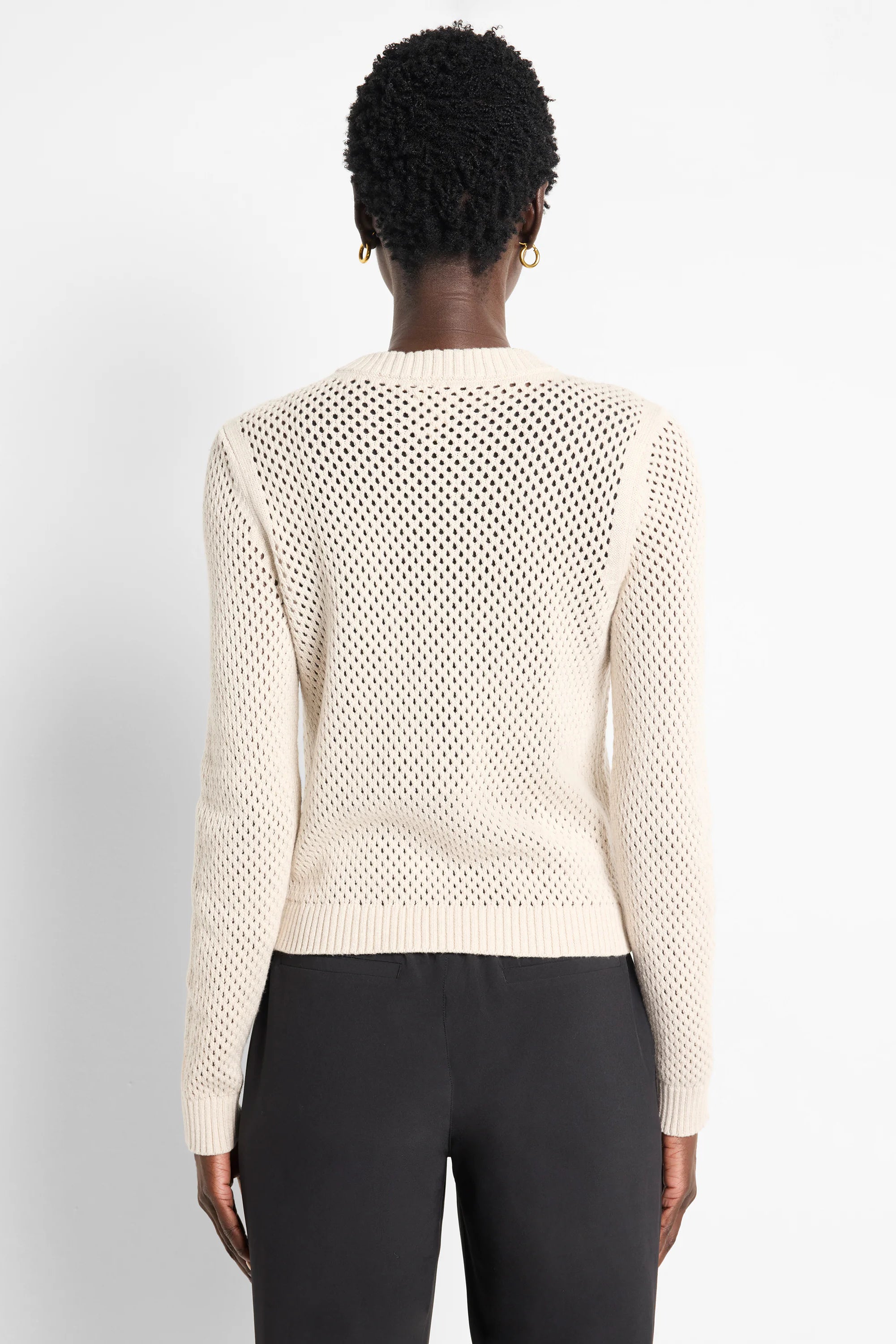 Off-white zip-front mesh cardigan. The mesh pattern is evenly spaced.
