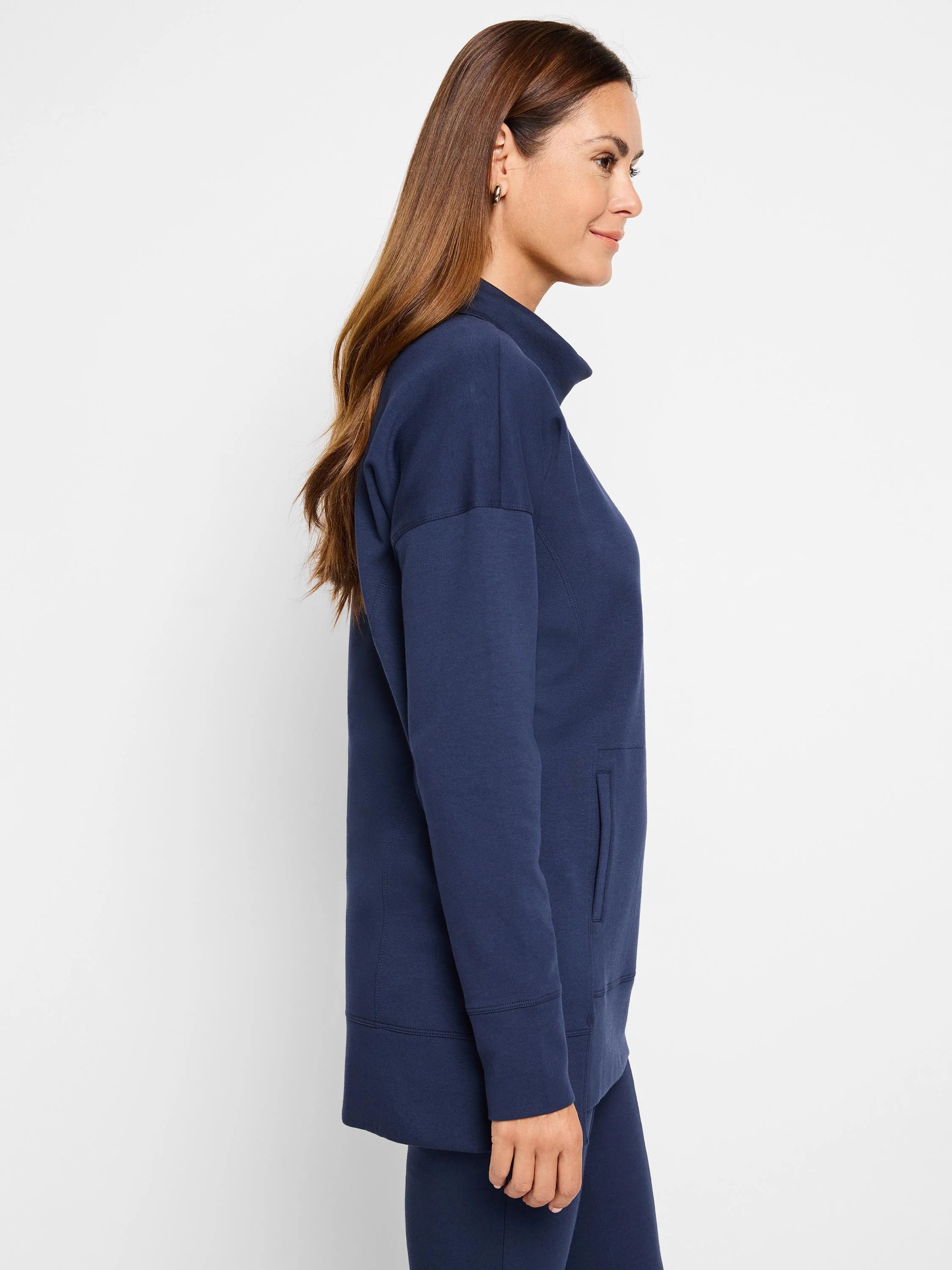 Navy blue tunic with funnel neck, long sleeves, and a kangaroo pocket. Seams are visible.