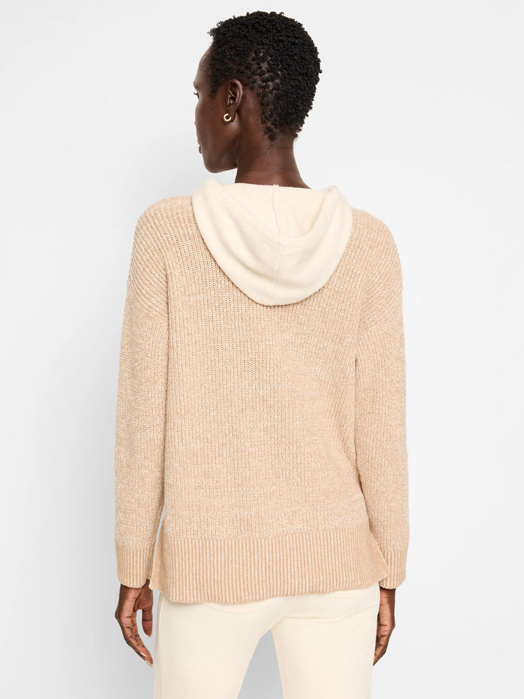 Beige cable knit hooded sweater with off-white hood. Back view.