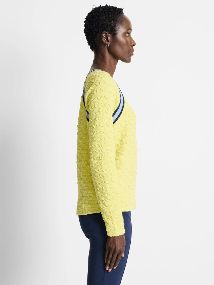 Pale yellow textured pullover sweater with navy and light blue shoulder stripes. Long sleeves.
