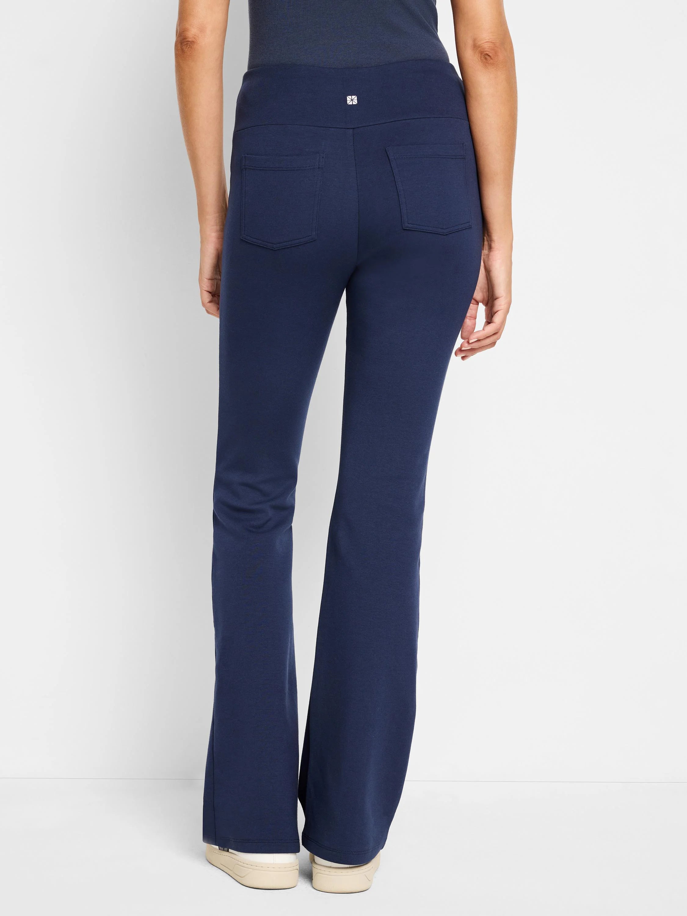 Dark navy blue bootcut pants; back view shows a waistband and two back pockets.