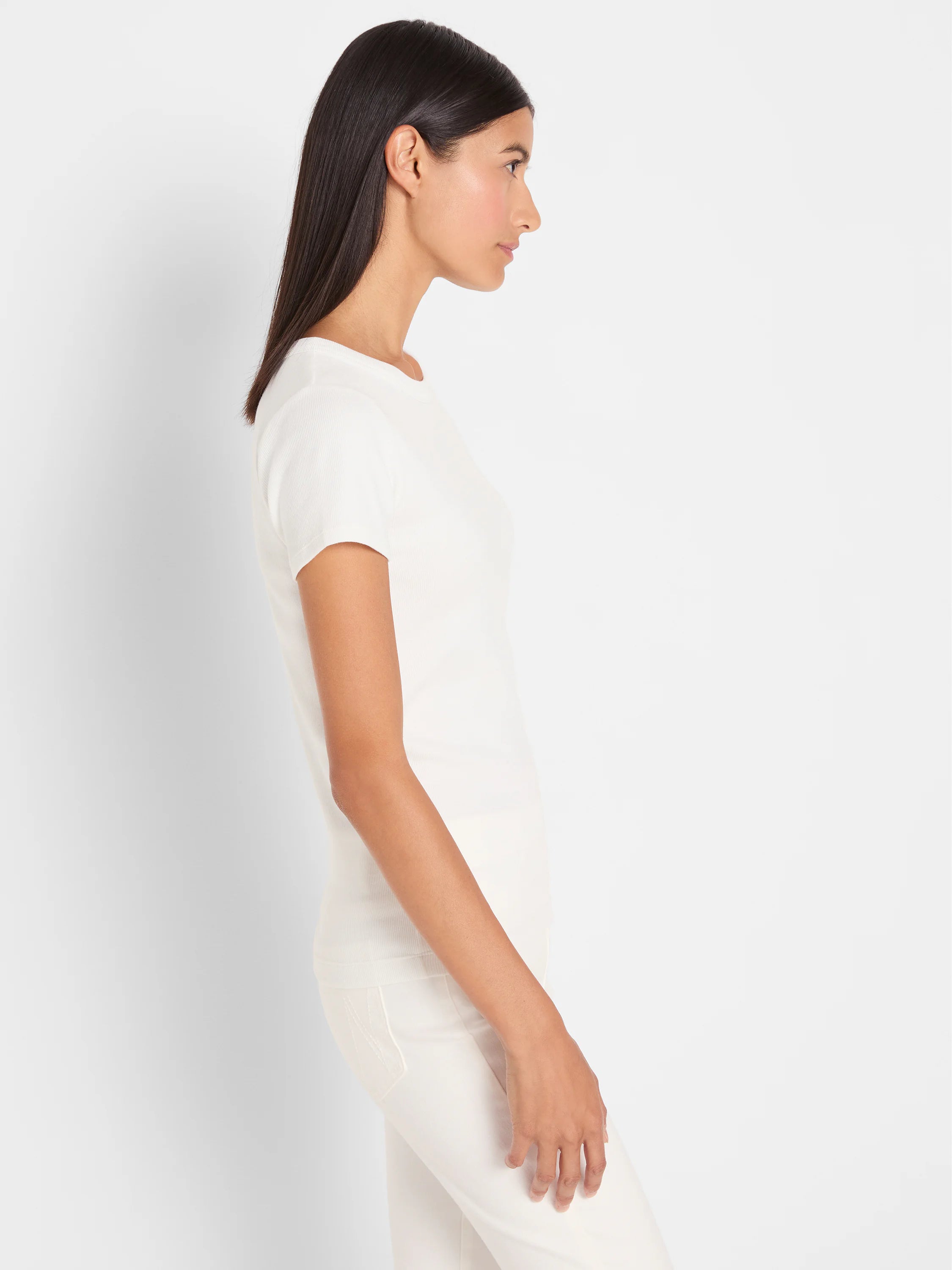 Cream ribbed knit short sleeve crew neck tee, shown fitted on a model.