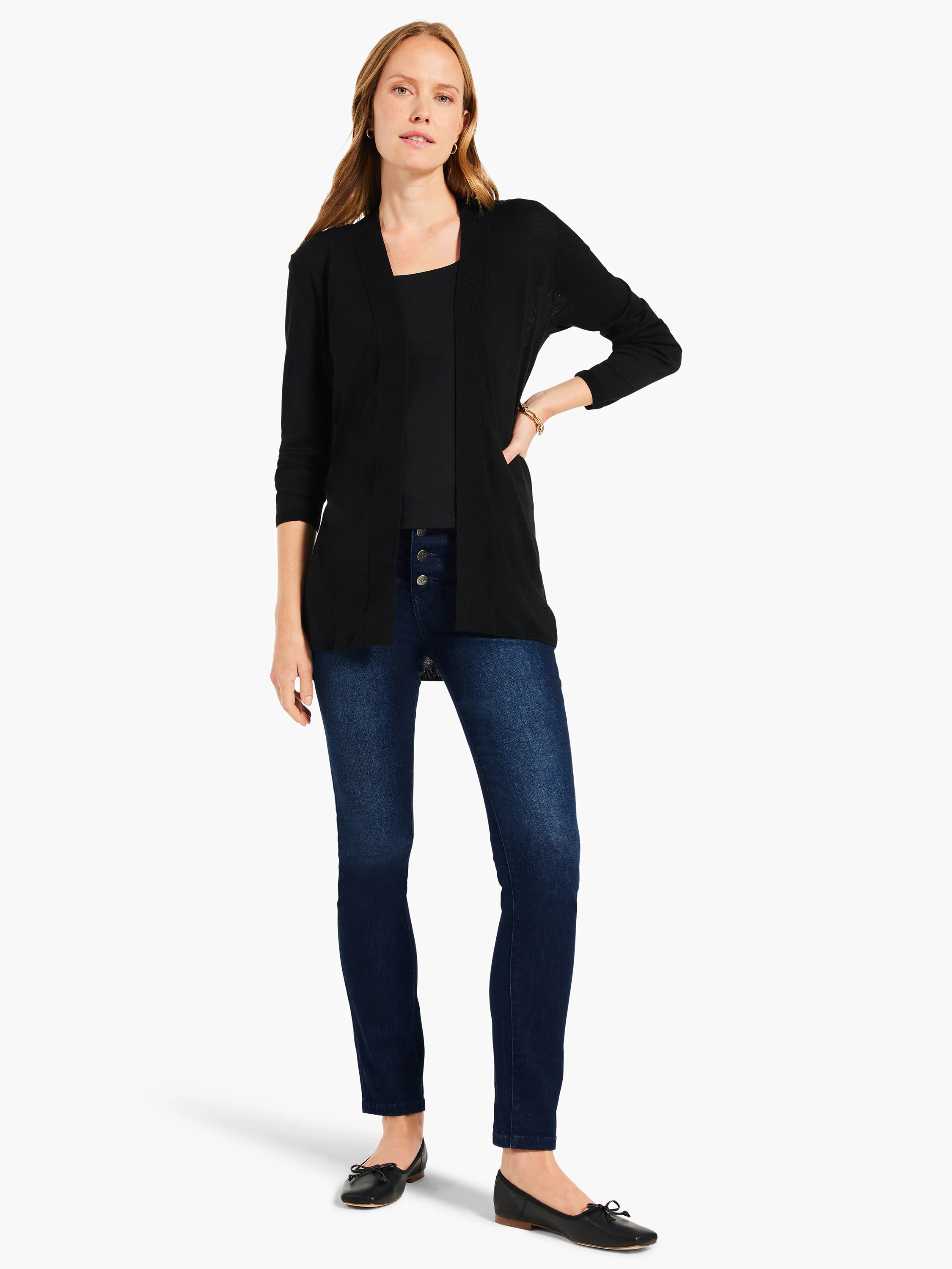 Model wears a black square-neck tank top.